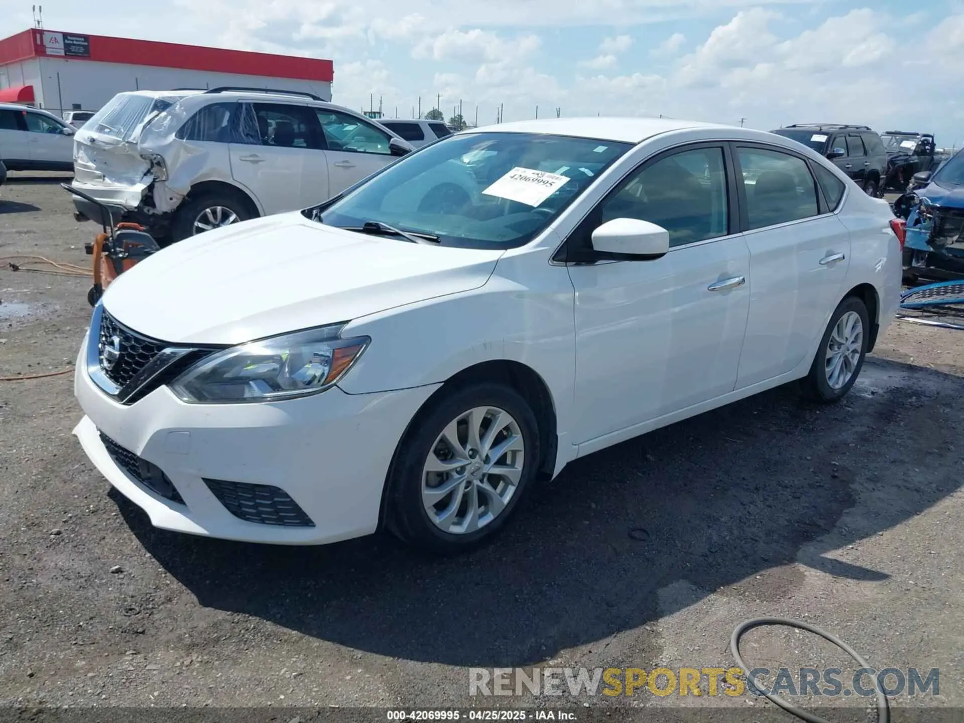 2 fotografías del automóvil dañado 3N1AB7AP8KY237172 NISSAN SENTRA 2019