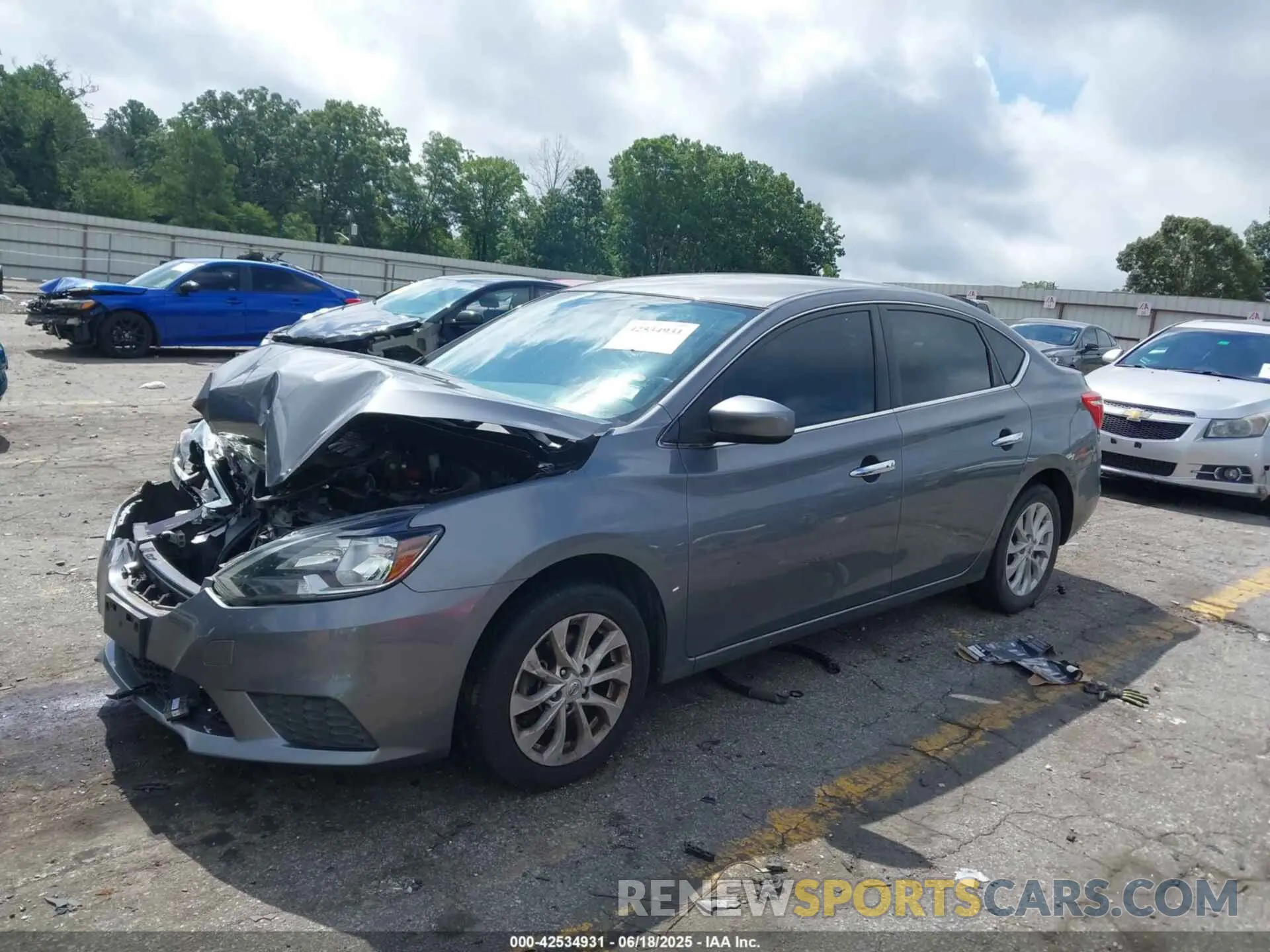 2 fotografías del automóvil dañado 3N1AB7AP8KY429868 NISSAN SENTRA 2019