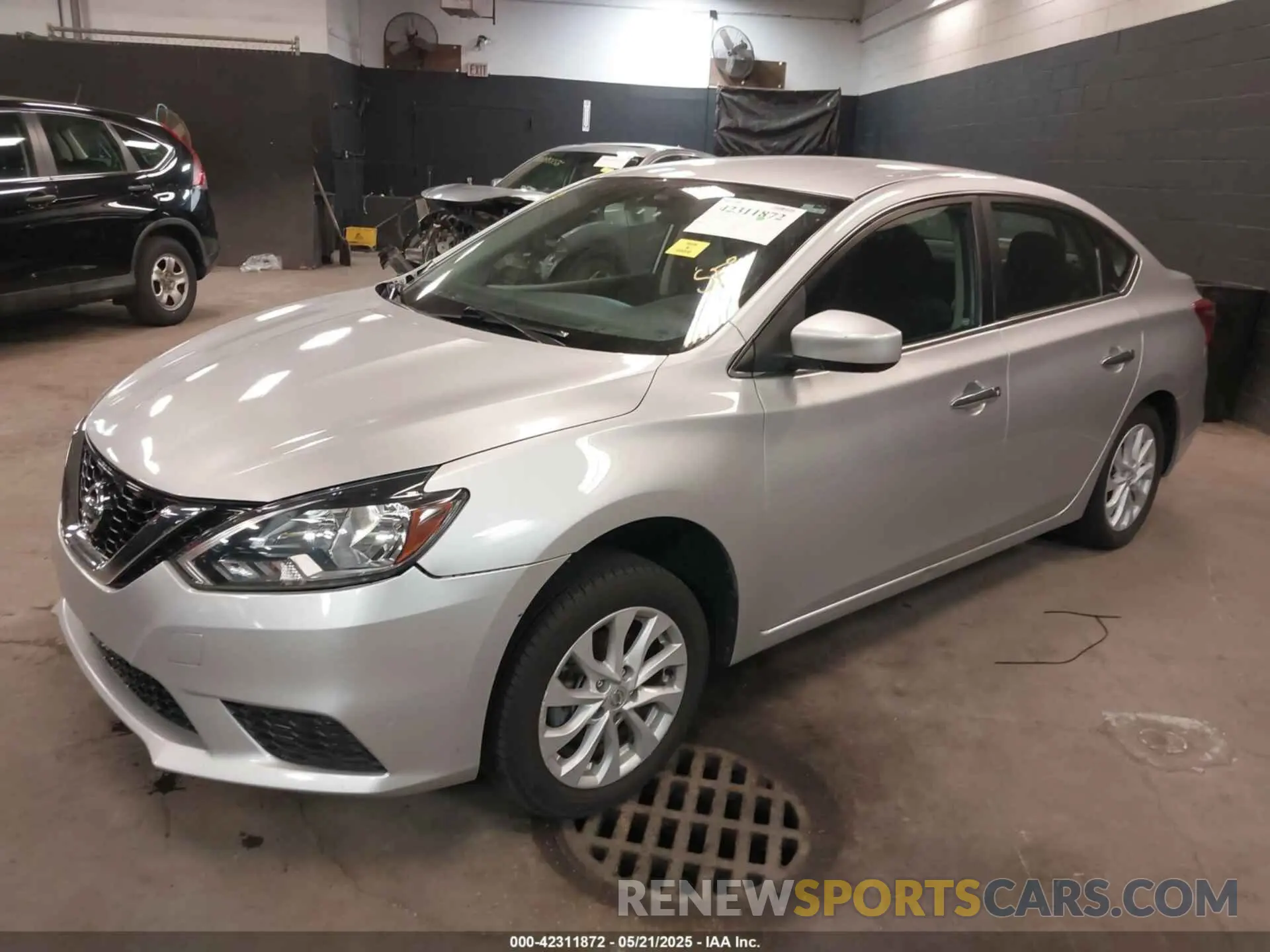 2 fotografías del automóvil dañado 3N1AB7APXKY353974 NISSAN SENTRA 2019