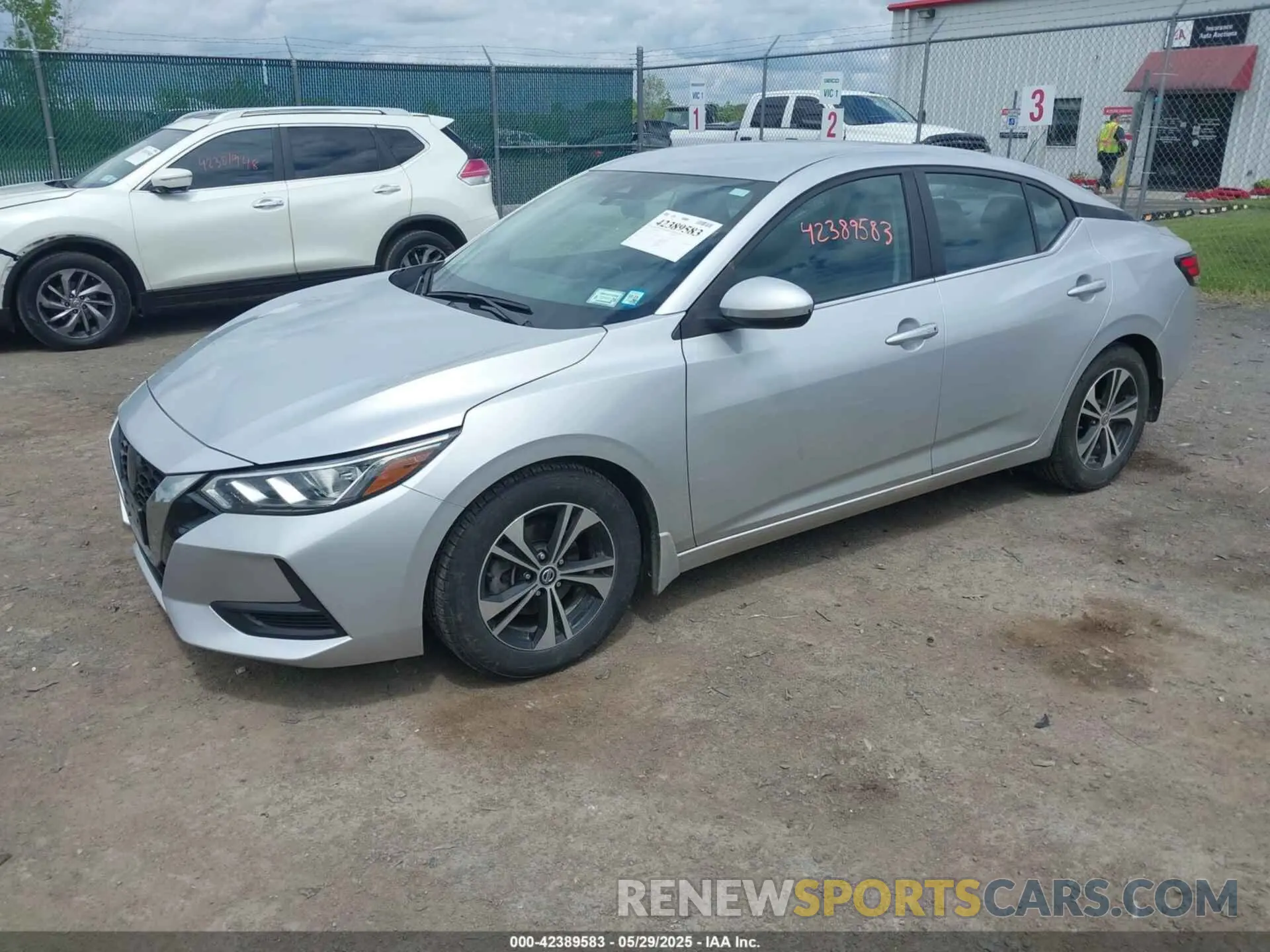 2 fotografías del automóvil dañado 3N1AB8CVXMY323412 NISSAN SENTRA 2021