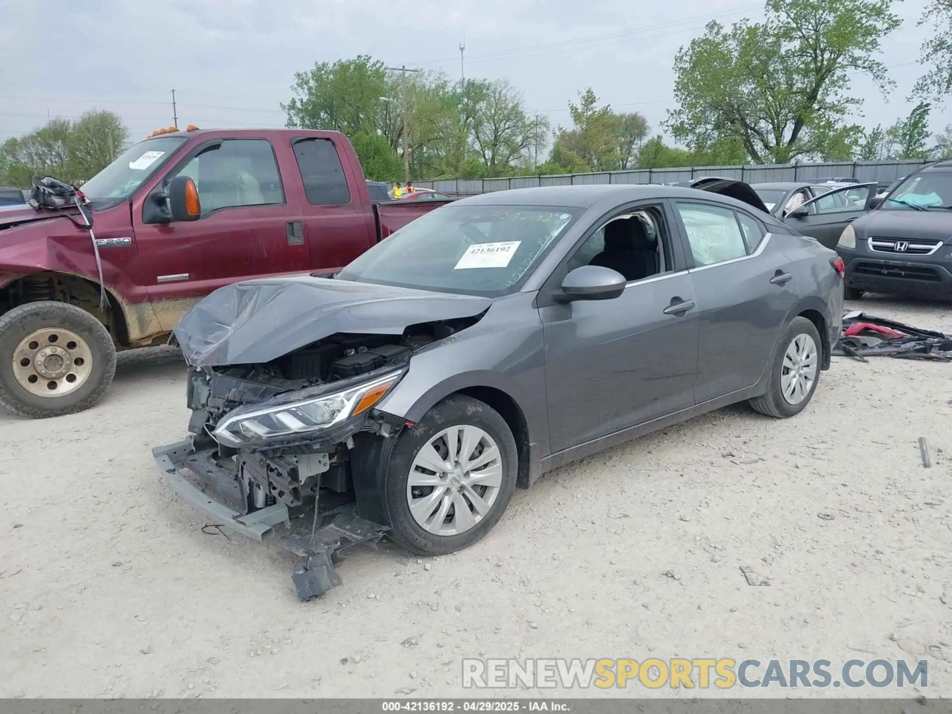 2 fotografías del automóvil dañado 3N1AB8BV0NY281819 NISSAN SENTRA 2022