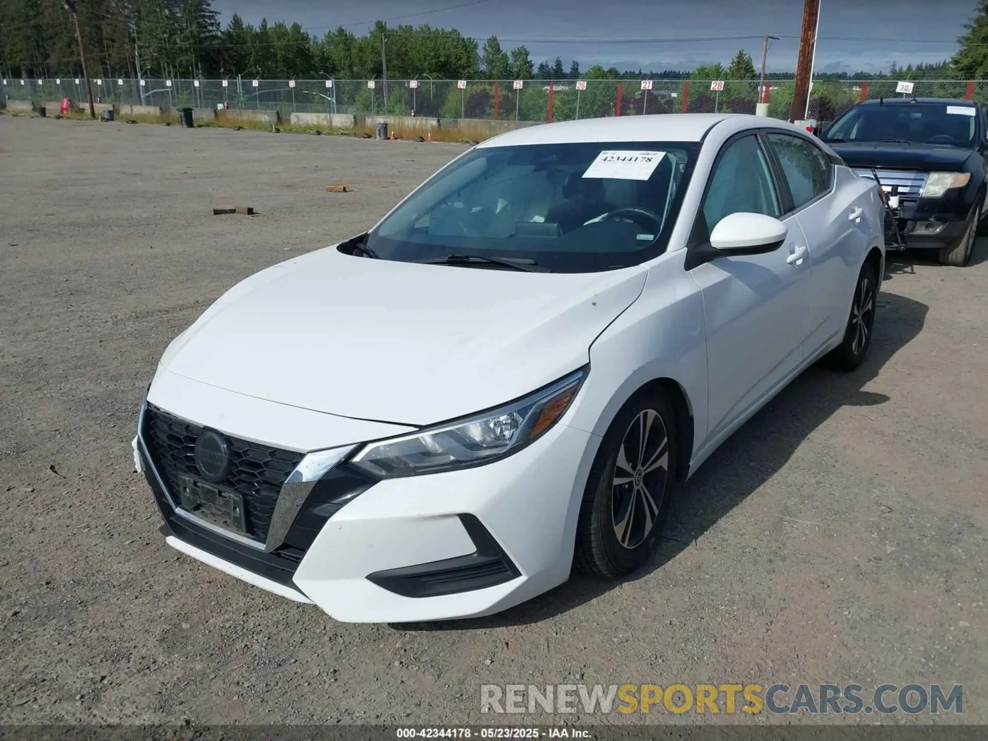2 fotografías del automóvil dañado 3N1AB8CV1NY272528 NISSAN SENTRA 2022