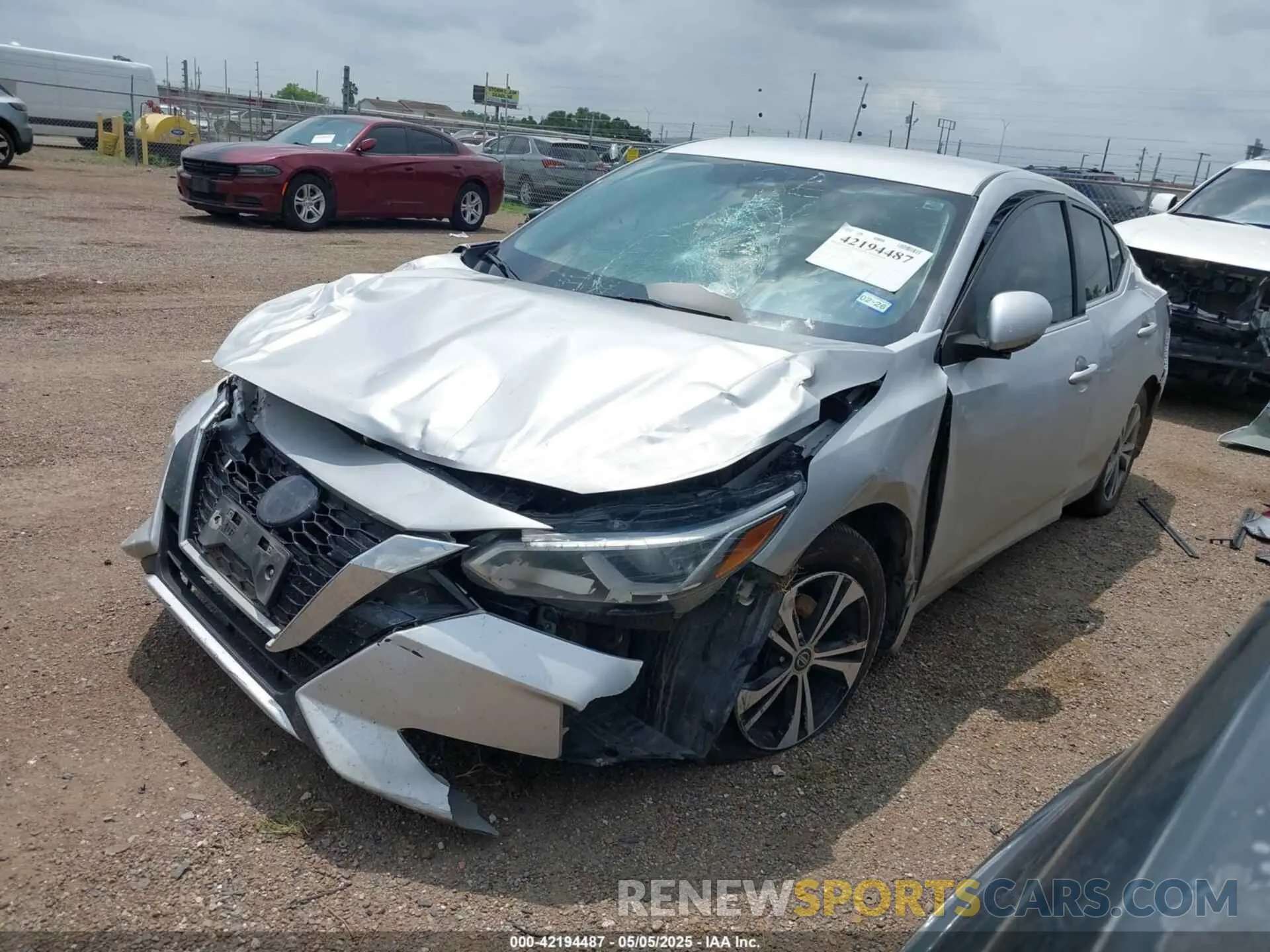 2 fotografías del automóvil dañado 3N1AB8CV3NY215330 NISSAN SENTRA 2022