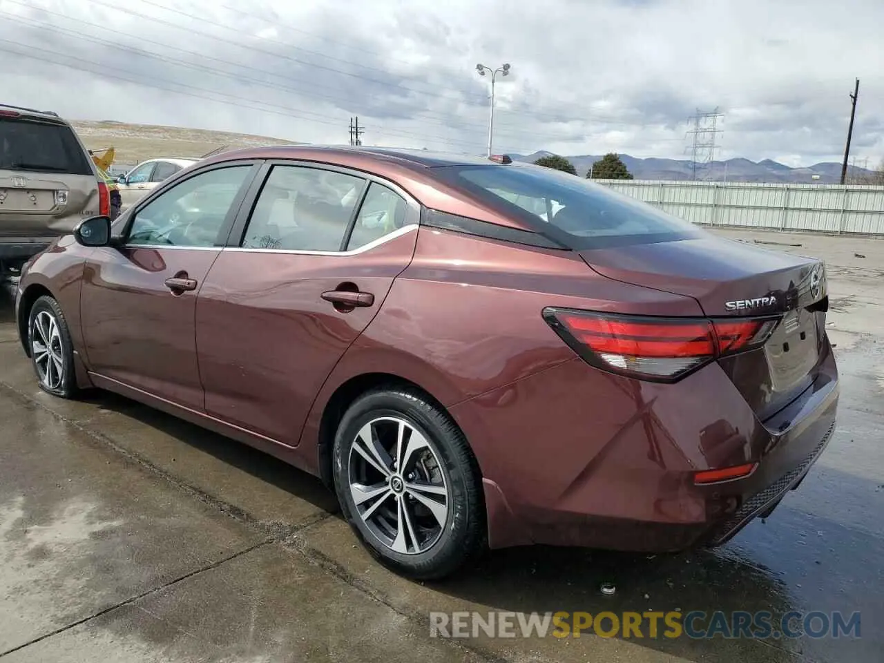 2 fotografías del automóvil dañado 3N1AB8CV3NY263393 NISSAN SENTRA 2022