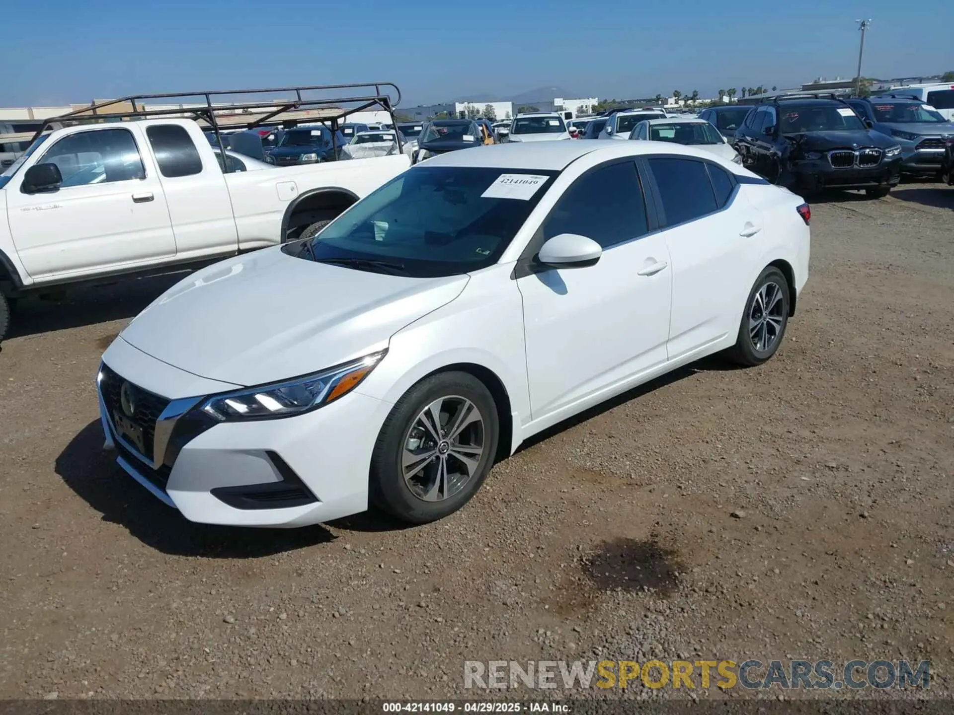 2 fotografías del automóvil dañado 3N1AB8CV3NY27460E NISSAN SENTRA 2022