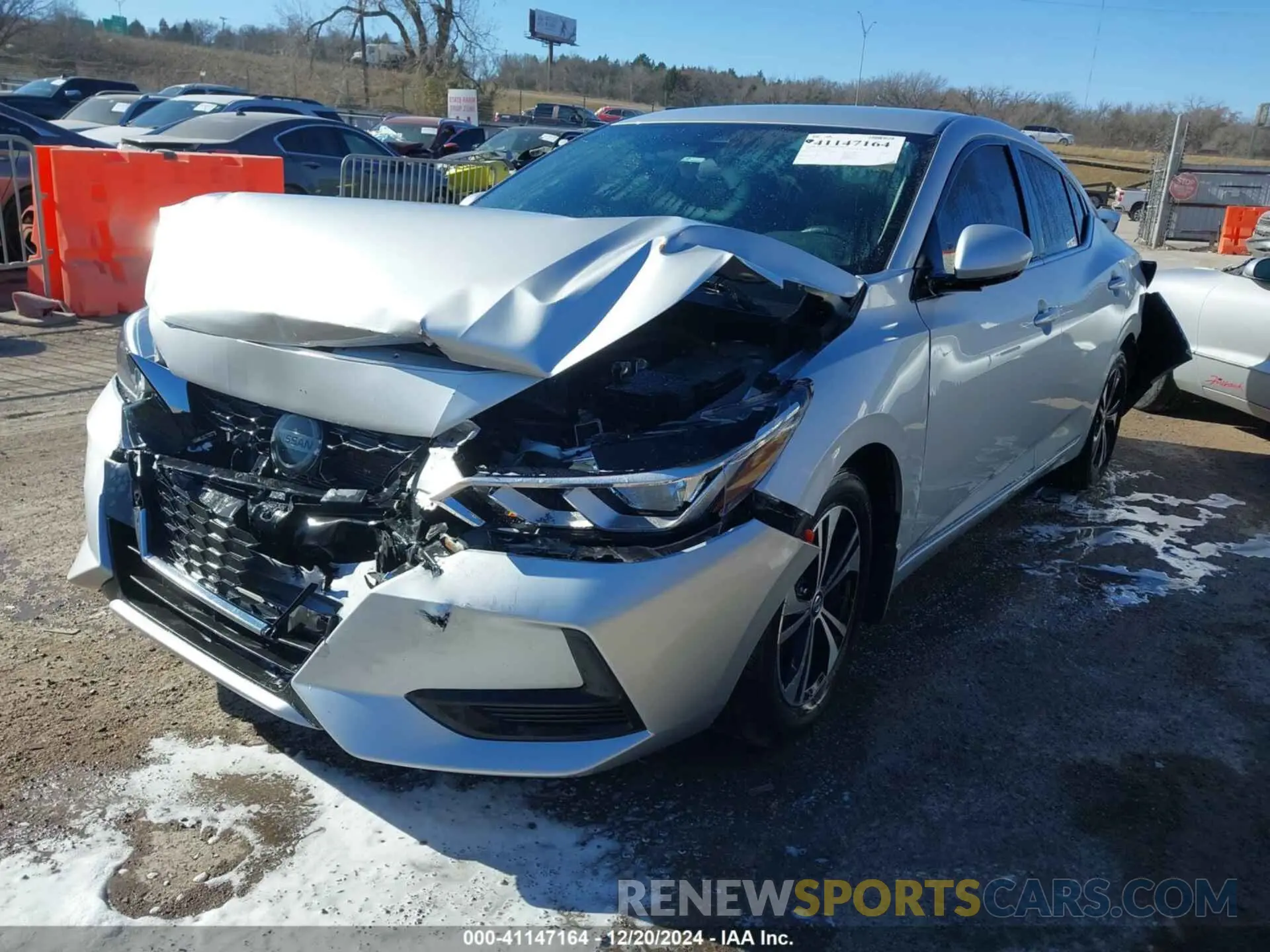 2 fotografías del automóvil dañado 3N1AB8CV3NY306601 NISSAN SENTRA 2022