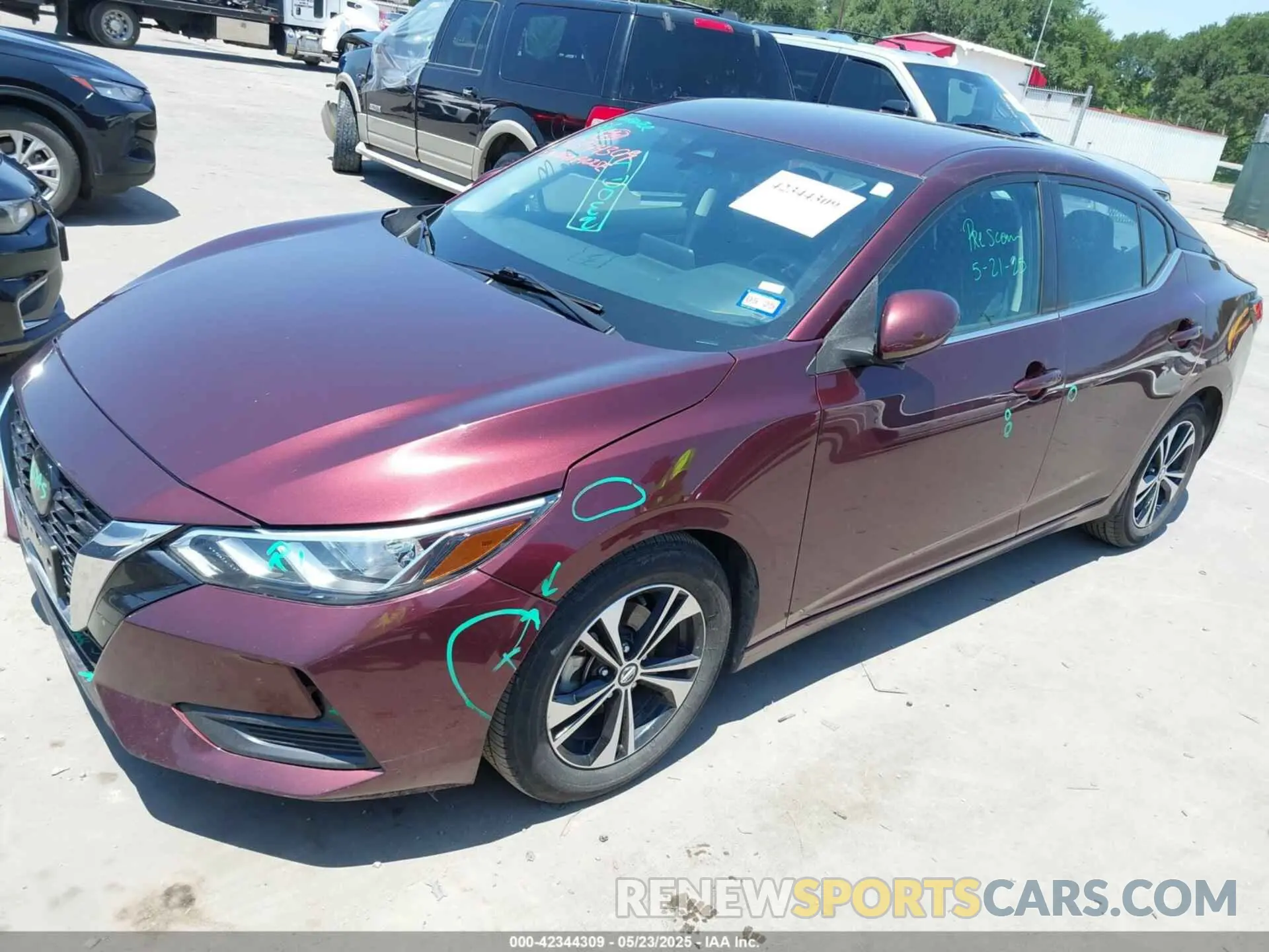 2 fotografías del automóvil dañado 3N1AB8CV7NY223432 NISSAN SENTRA 2022