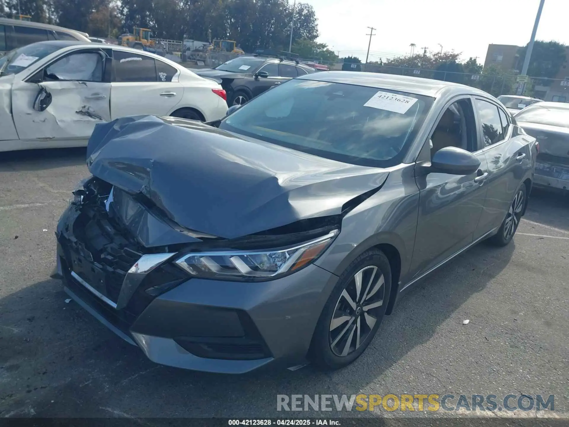 2 fotografías del automóvil dañado 3N1AB8CV9NY295488 NISSAN SENTRA 2022