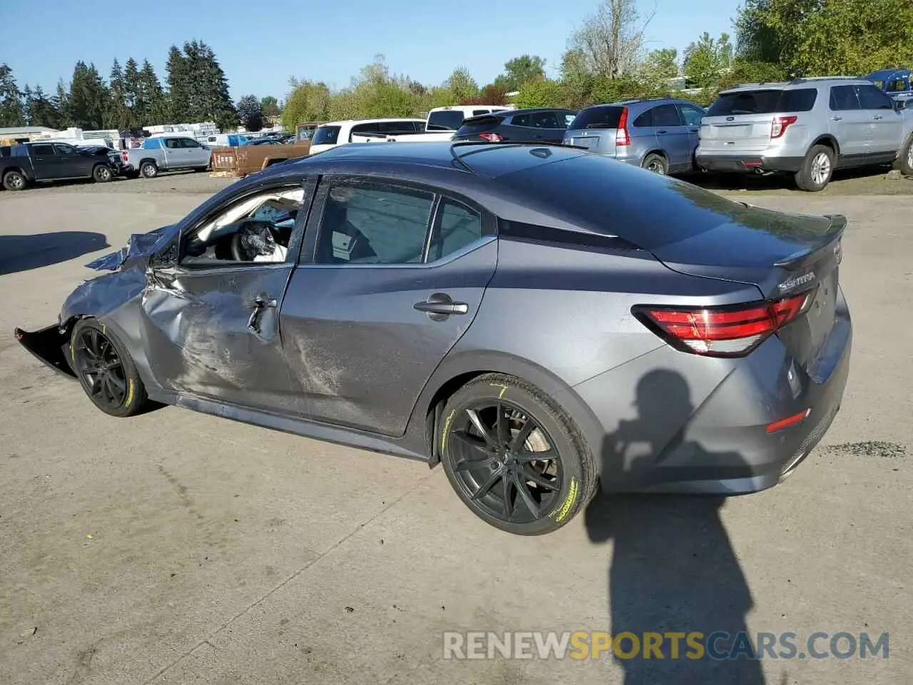 2 fotografías del automóvil dañado 3N1AB8DV8NY275389 NISSAN SENTRA 2022