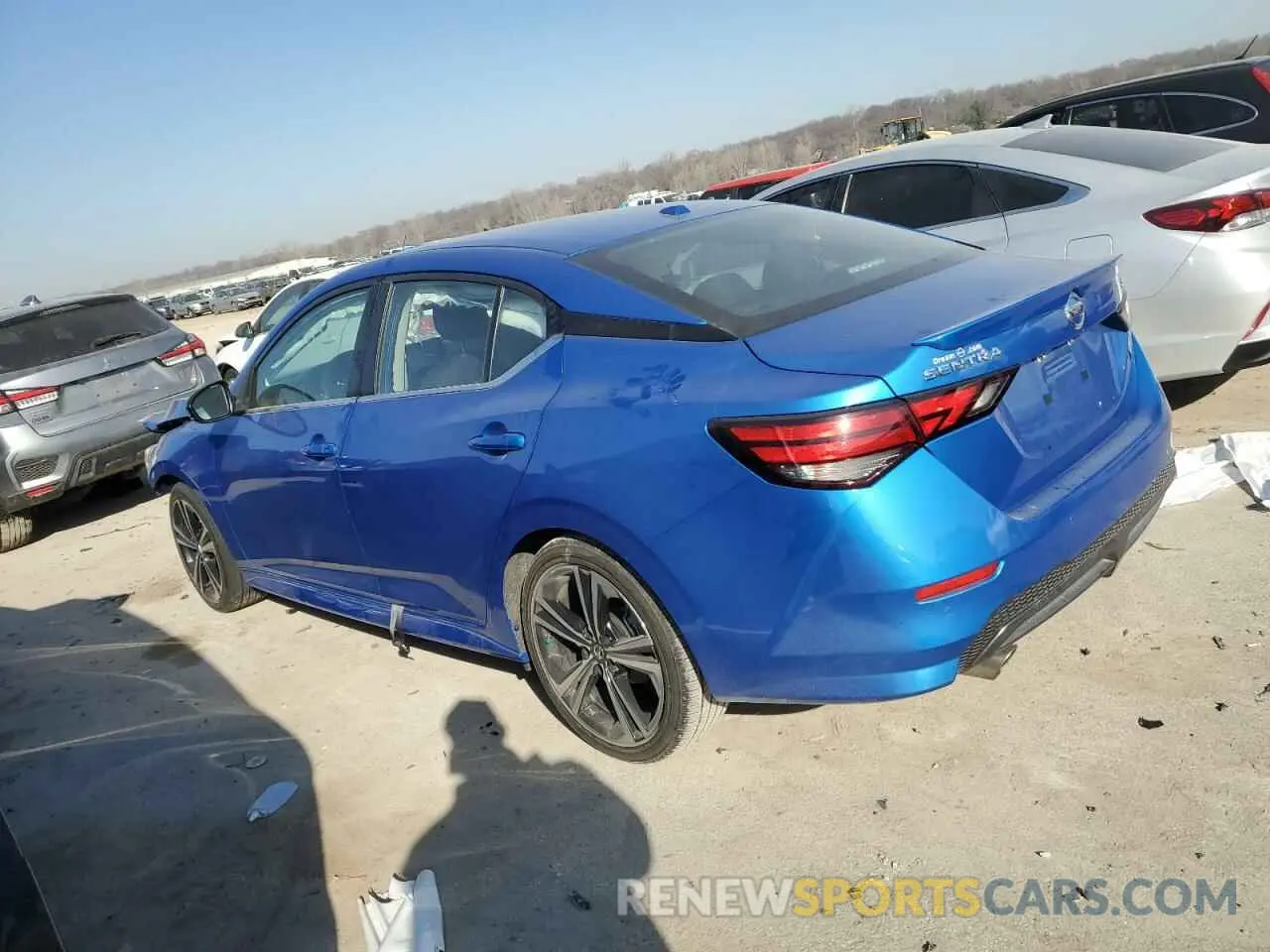 2 fotografías del automóvil dañado 3N1AB8DV9NY317150 NISSAN SENTRA 2022