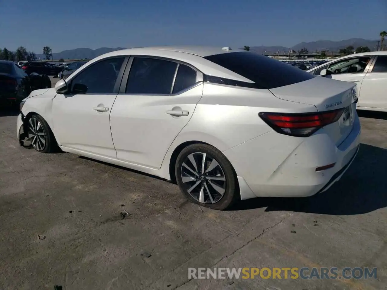 2 fotografías del automóvil dañado 3N1AB8CV2PY293858 NISSAN SENTRA 2023