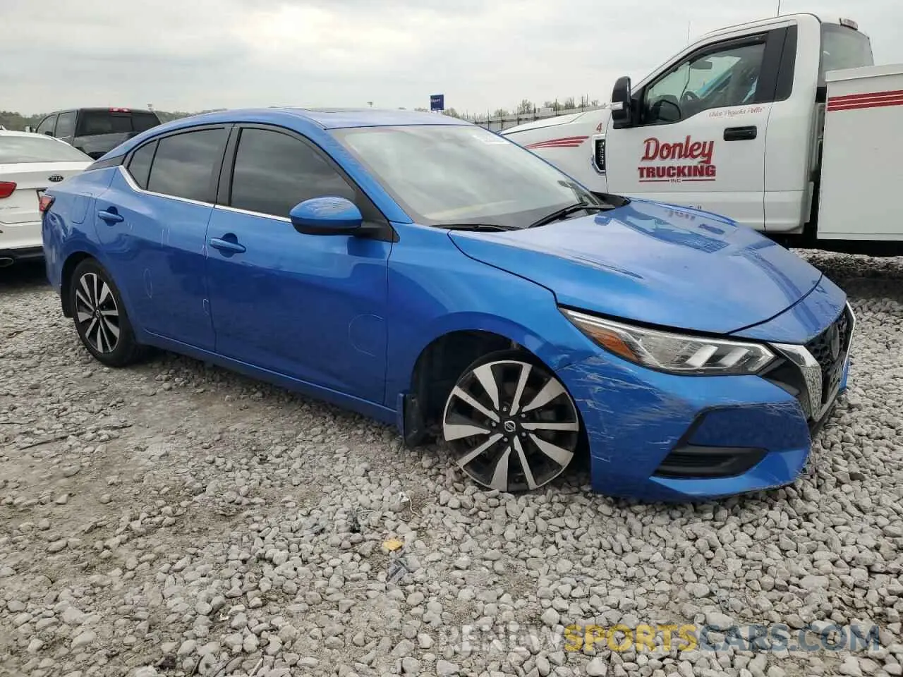 4 fotografías del automóvil dañado 3N1AB8CV2PY300520 NISSAN SENTRA 2023