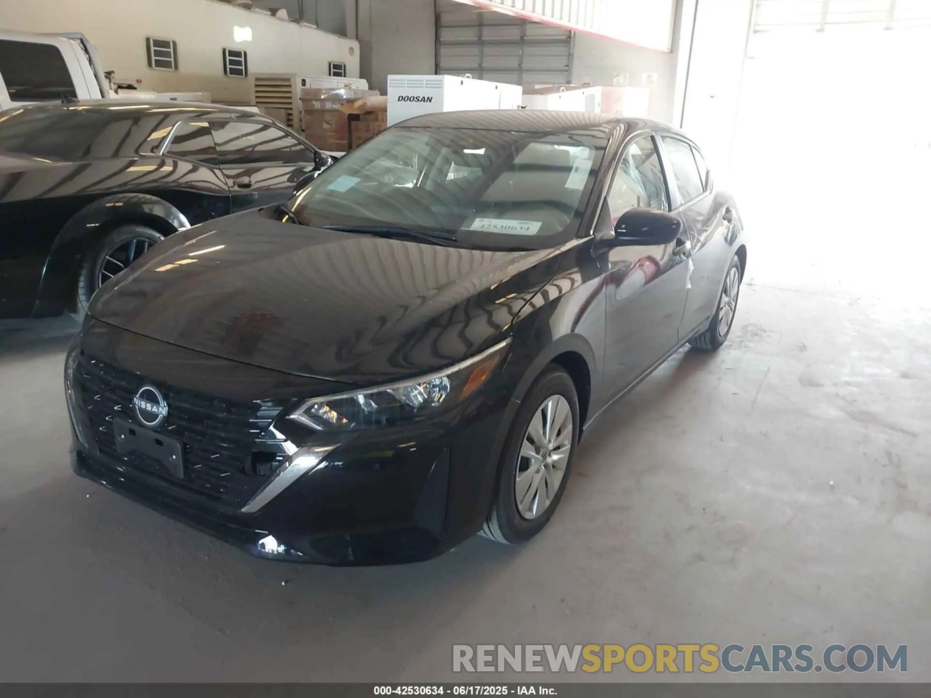2 fotografías del automóvil dañado 3N1AB8BV6SY323423 NISSAN SENTRA 2025