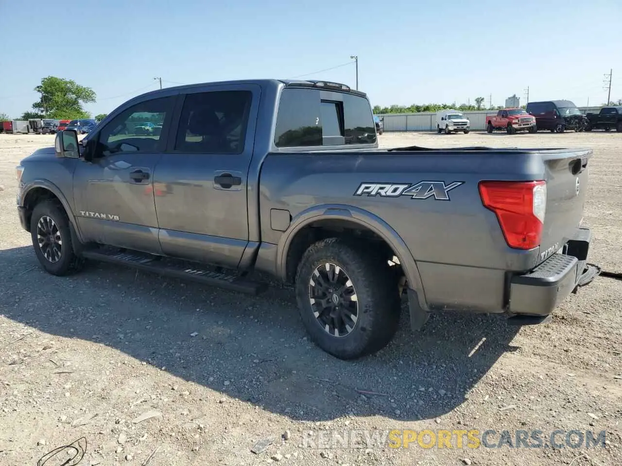 2 fotografías del automóvil dañado 1N6AA1E53KN532356 NISSAN TITAN 2019
