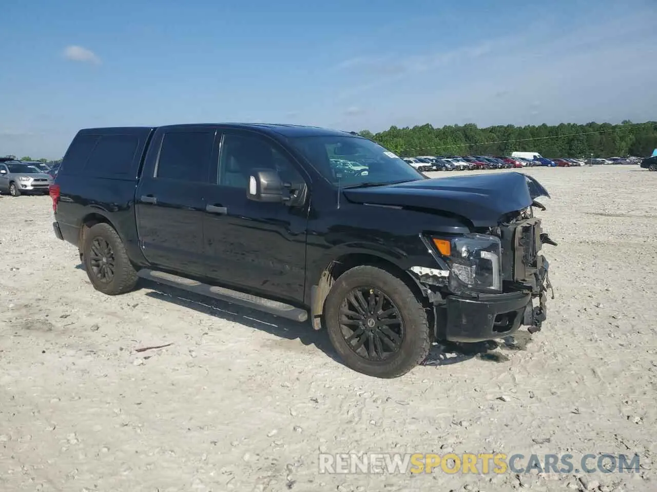 4 fotografías del automóvil dañado 1N6AA1E56KN522176 NISSAN TITAN 2019