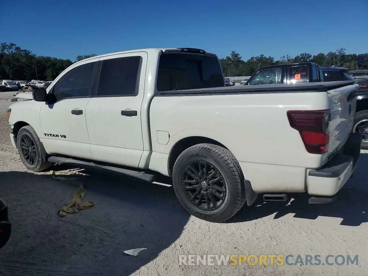2 fotografías del automóvil dañado 1N6AA1E68KN509342 NISSAN TITAN 2019
