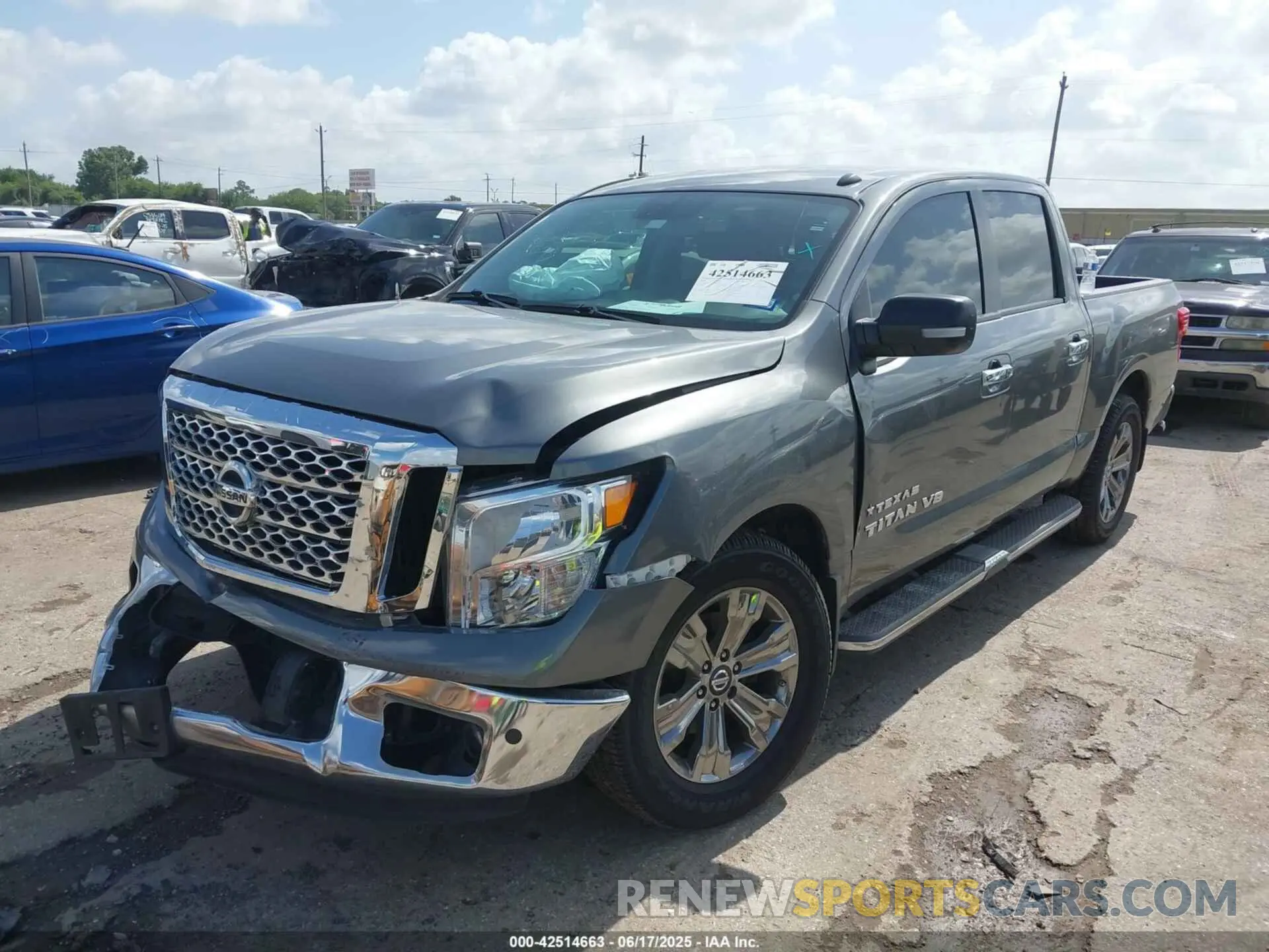 2 fotografías del automóvil dañado 1N6AA1E68KN525413 NISSAN TITAN 2019