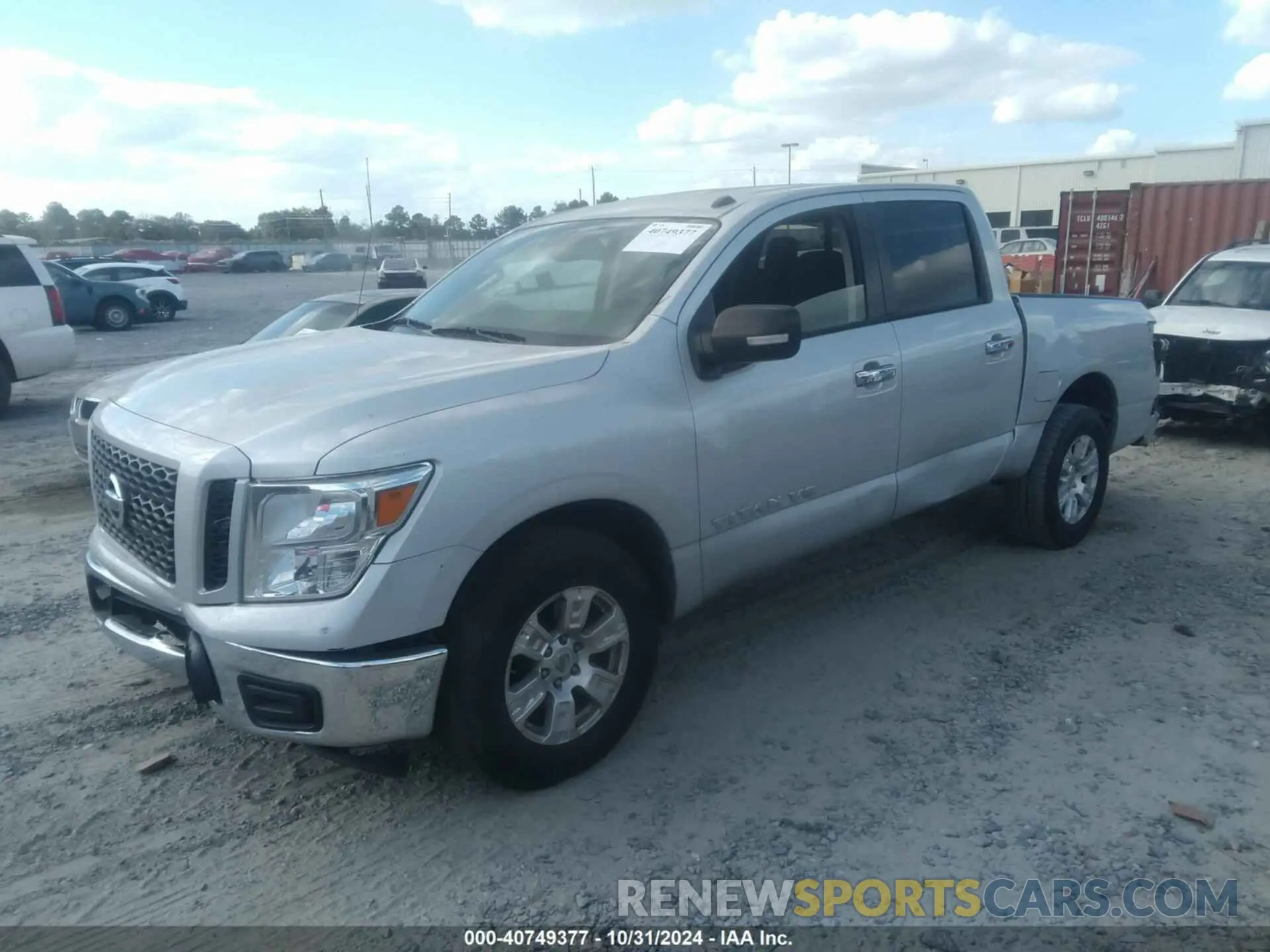 2 fotografías del automóvil dañado 1N6AA1EKXKN516970 NISSAN TITAN 2019