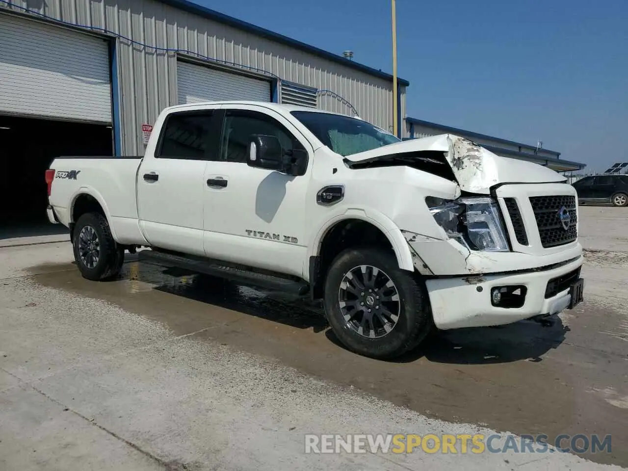 4 fotografías del automóvil dañado 1N6AA1F46KN517565 NISSAN TITAN 2019