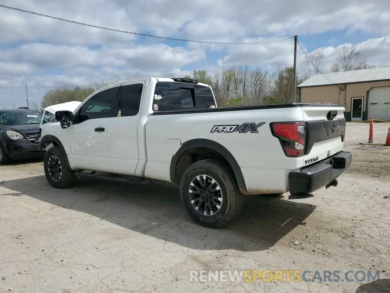 2 fotografías del automóvil dañado 1N6AA1CD6LN512081 NISSAN TITAN 2020