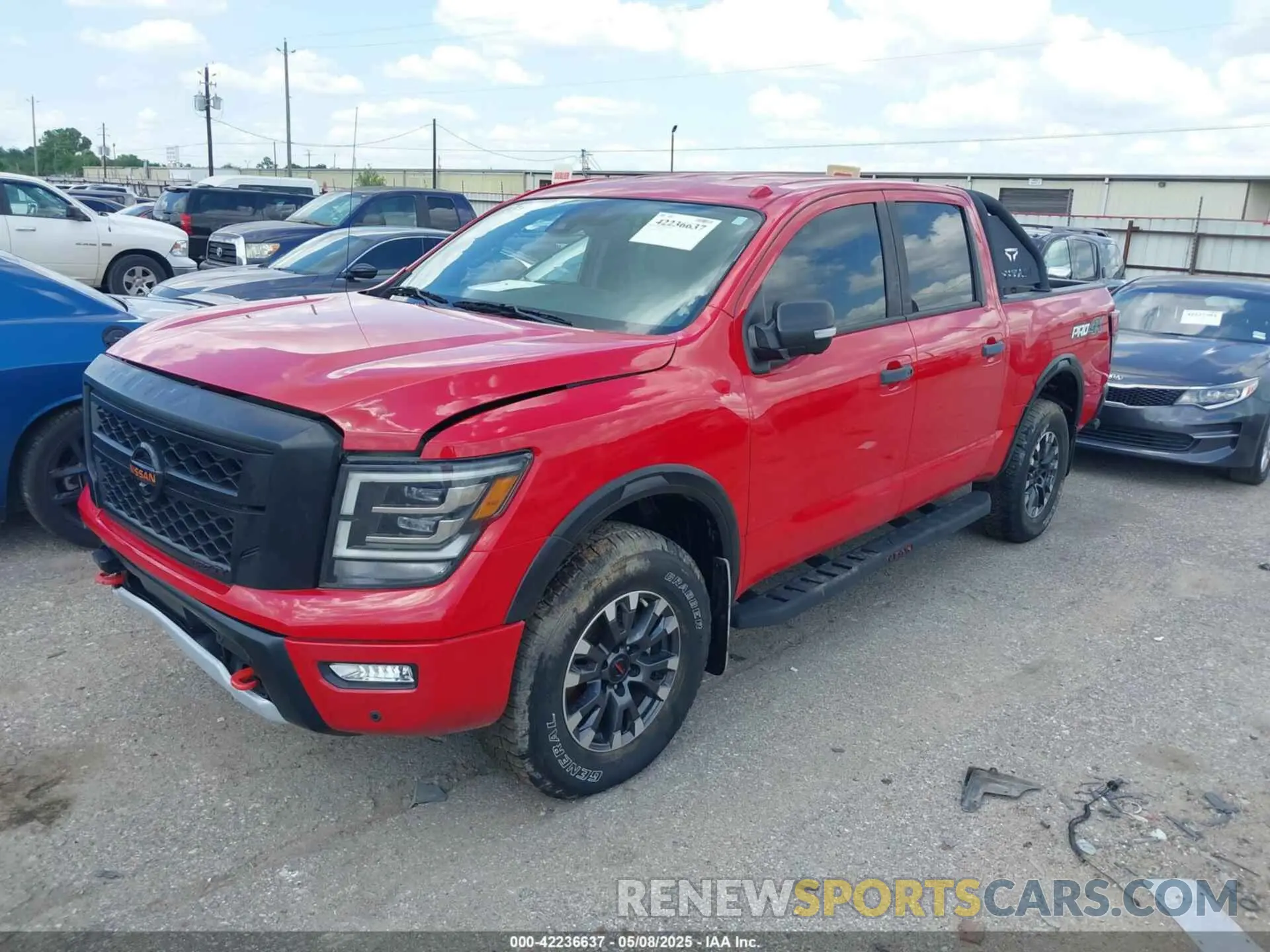 2 fotografías del automóvil dañado 1N6AA1ED9LN502965 NISSAN TITAN 2020