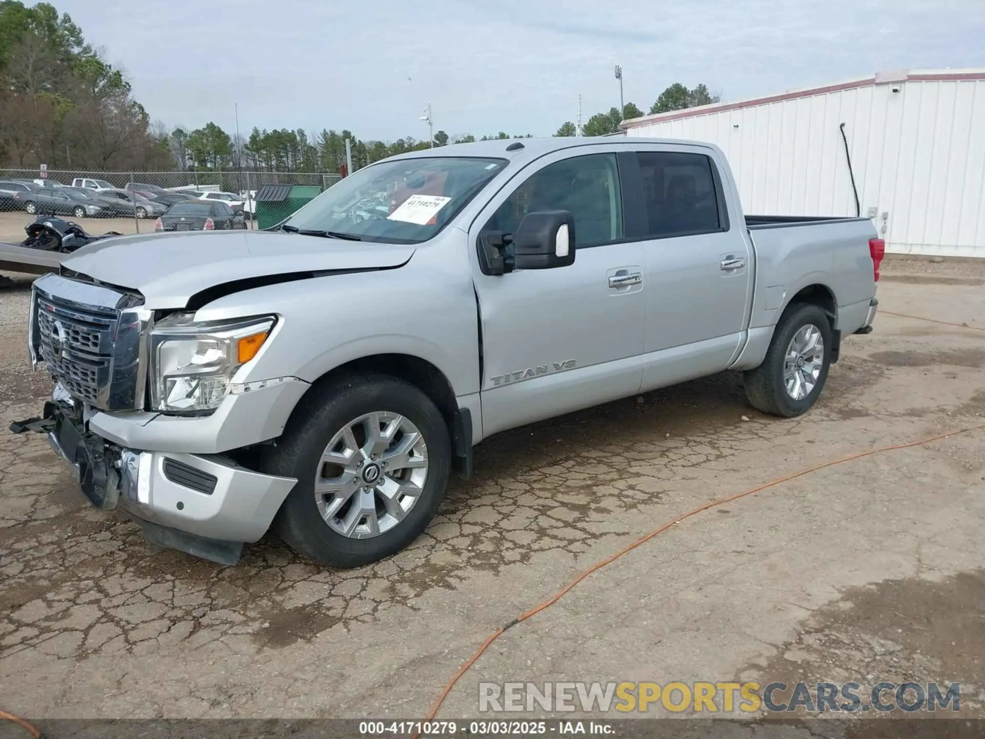 2 fotografías del automóvil dañado 1N6AA1EF6LN509924 NISSAN TITAN 2020