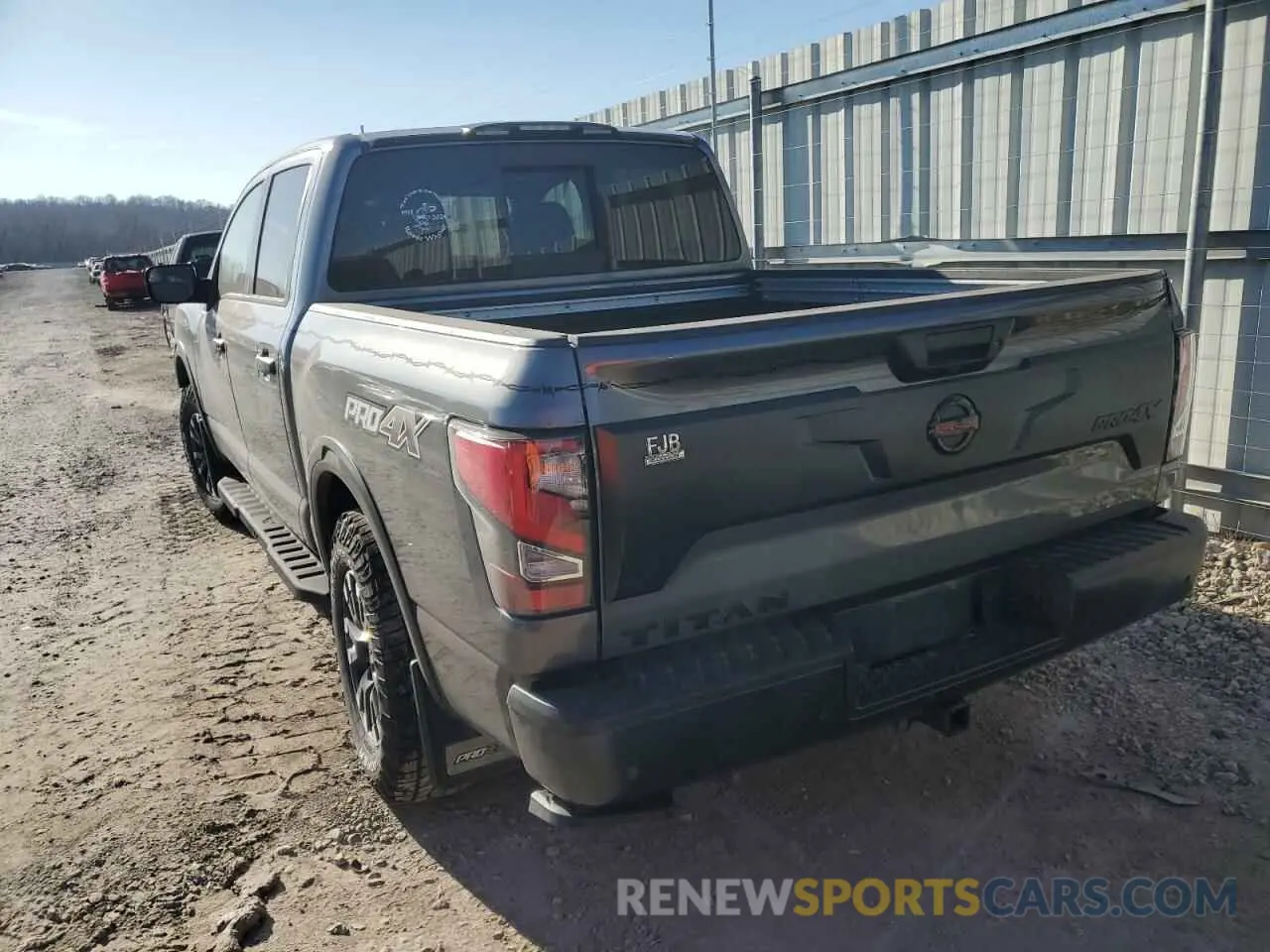 2 fotografías del automóvil dañado 1N6AA1ED6MN524956 NISSAN TITAN 2021