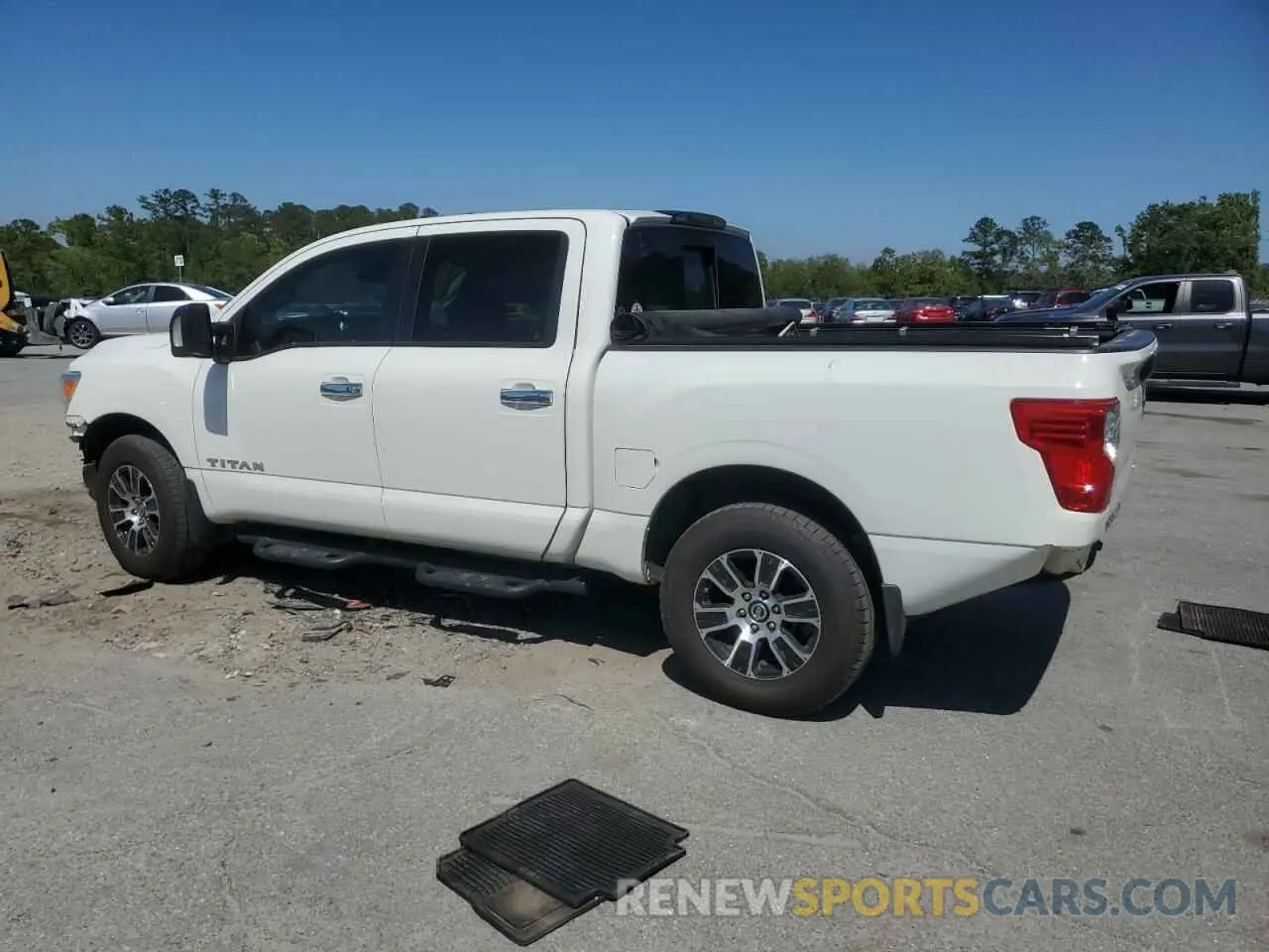 2 fotografías del automóvil dañado 1N6AA1EDXMN527522 NISSAN TITAN 2021