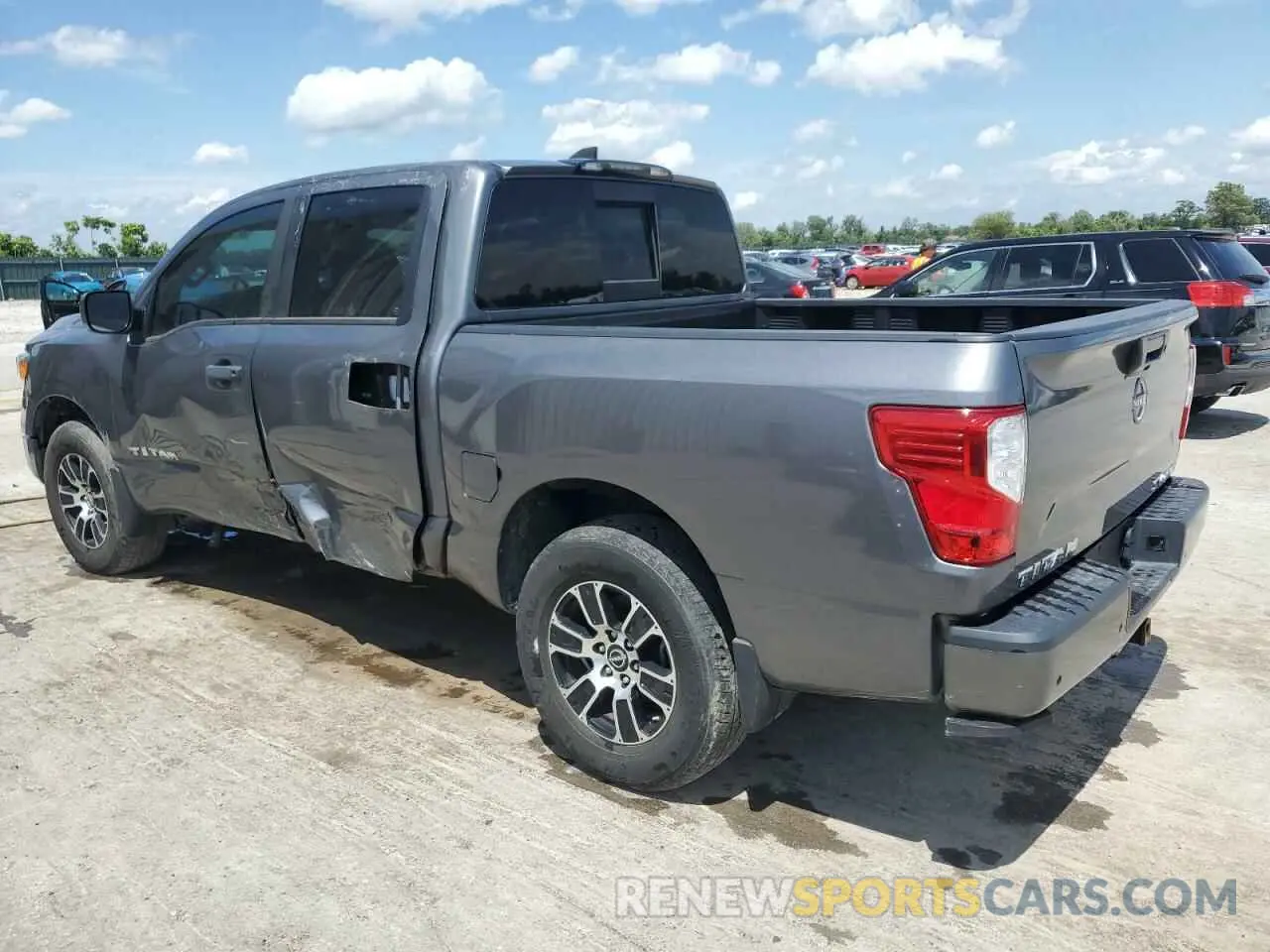 2 fotografías del automóvil dañado 1N6AA1ED7PN100903 NISSAN TITAN 2023