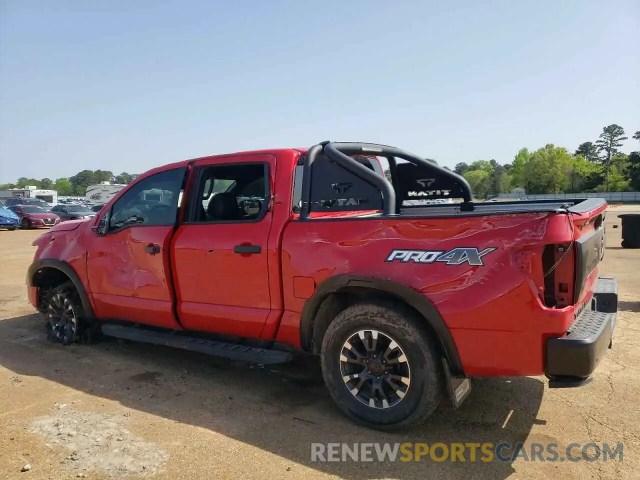 2 fotografías del automóvil dañado 1N6AA1ED9PN102488 NISSAN TITAN 2023