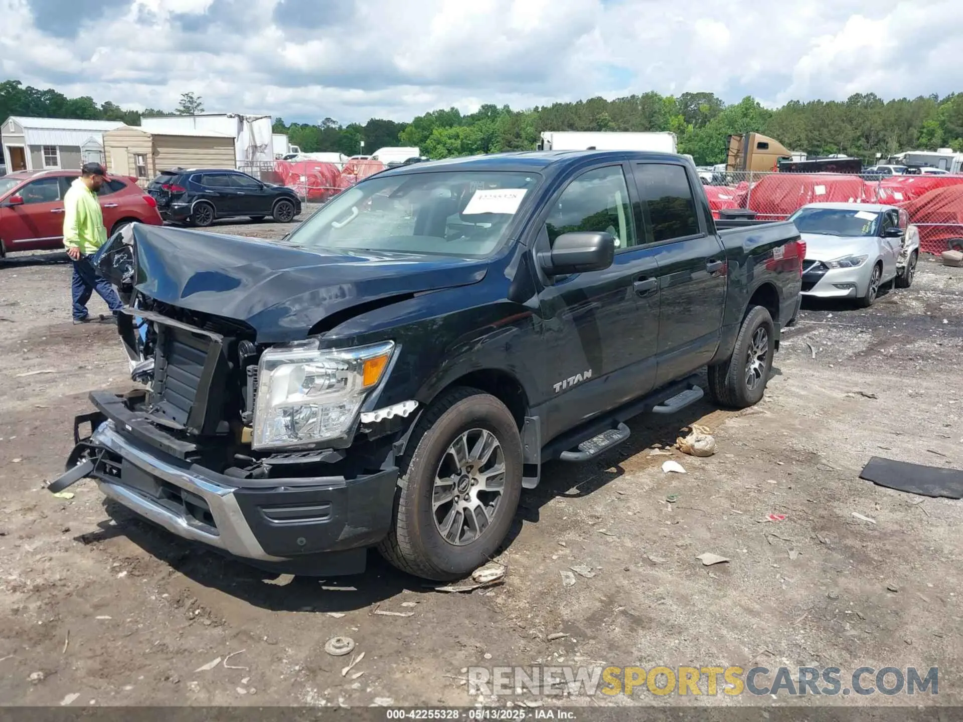2 fotografías del automóvil dañado 1N6AA1EF9PN113945 NISSAN TITAN 2023