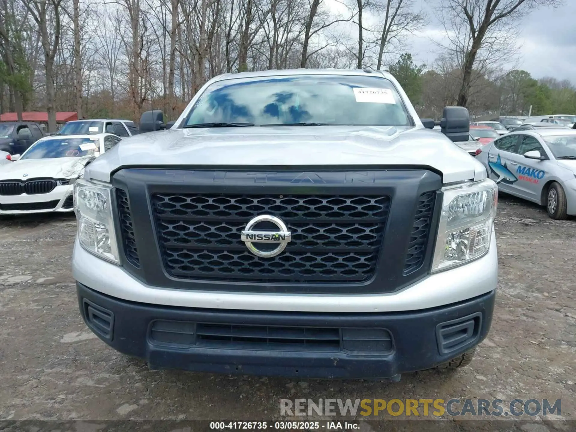 12 fotografías del automóvil dañado 1N6BA1F33KN514599 NISSAN TITAN XD 2019