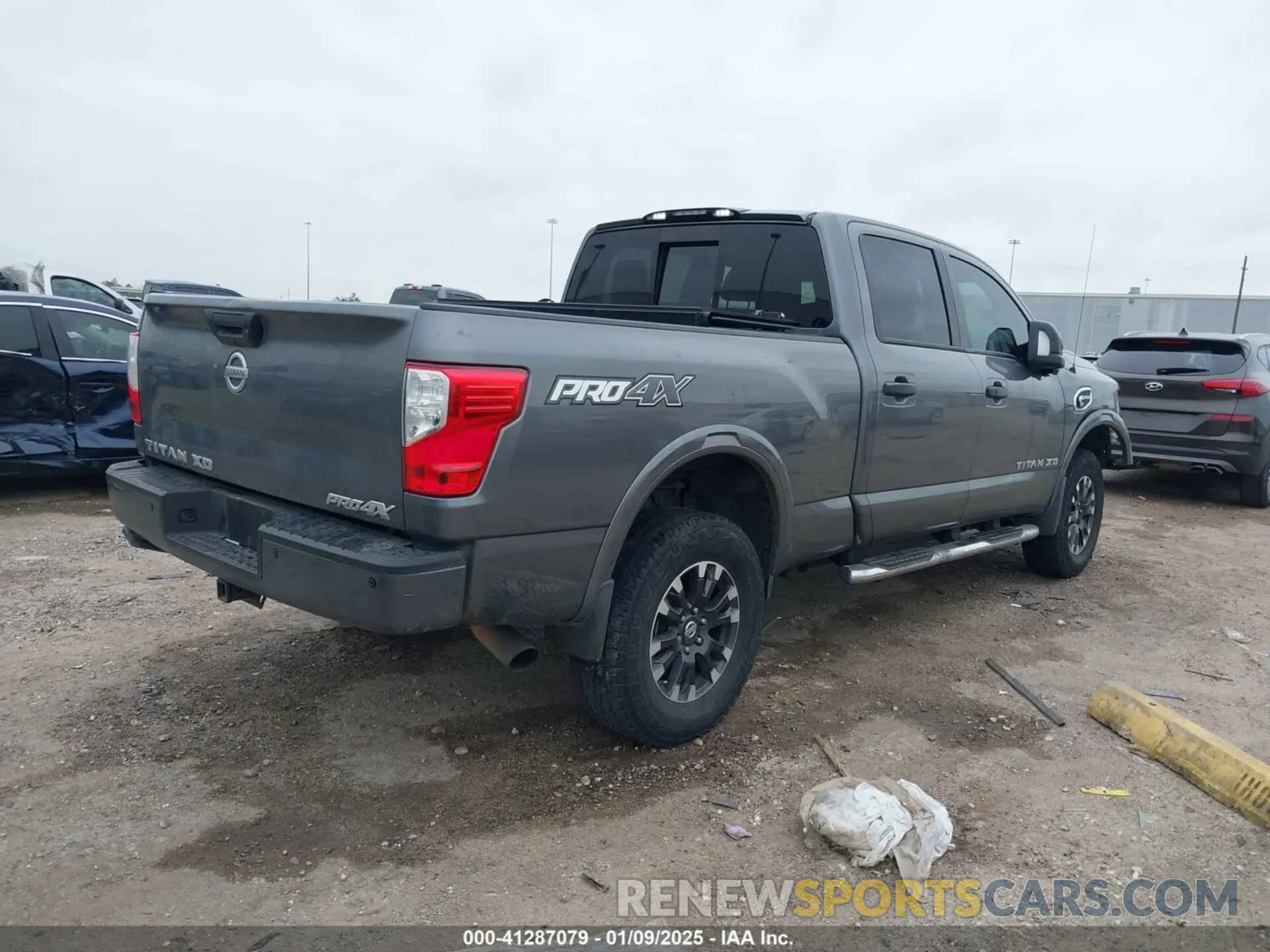 4 fotografías del automóvil dañado 1N6BA1F44KN509548 NISSAN TITAN XD 2019