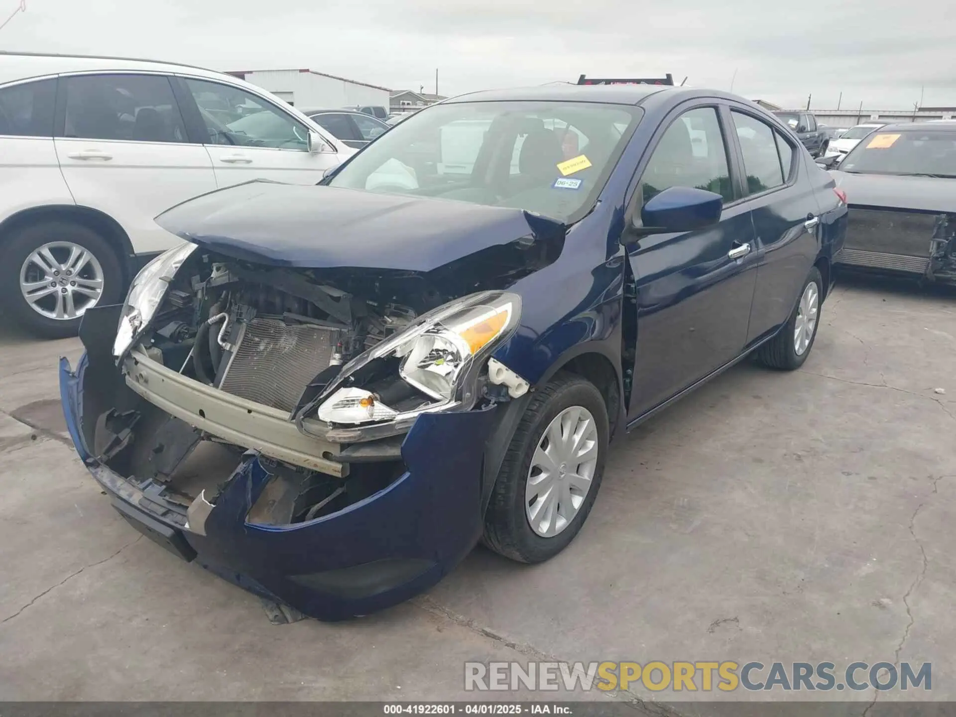 2 fotografías del automóvil dañado 3N1CN7AP0KL827024 NISSAN VERSA 2019
