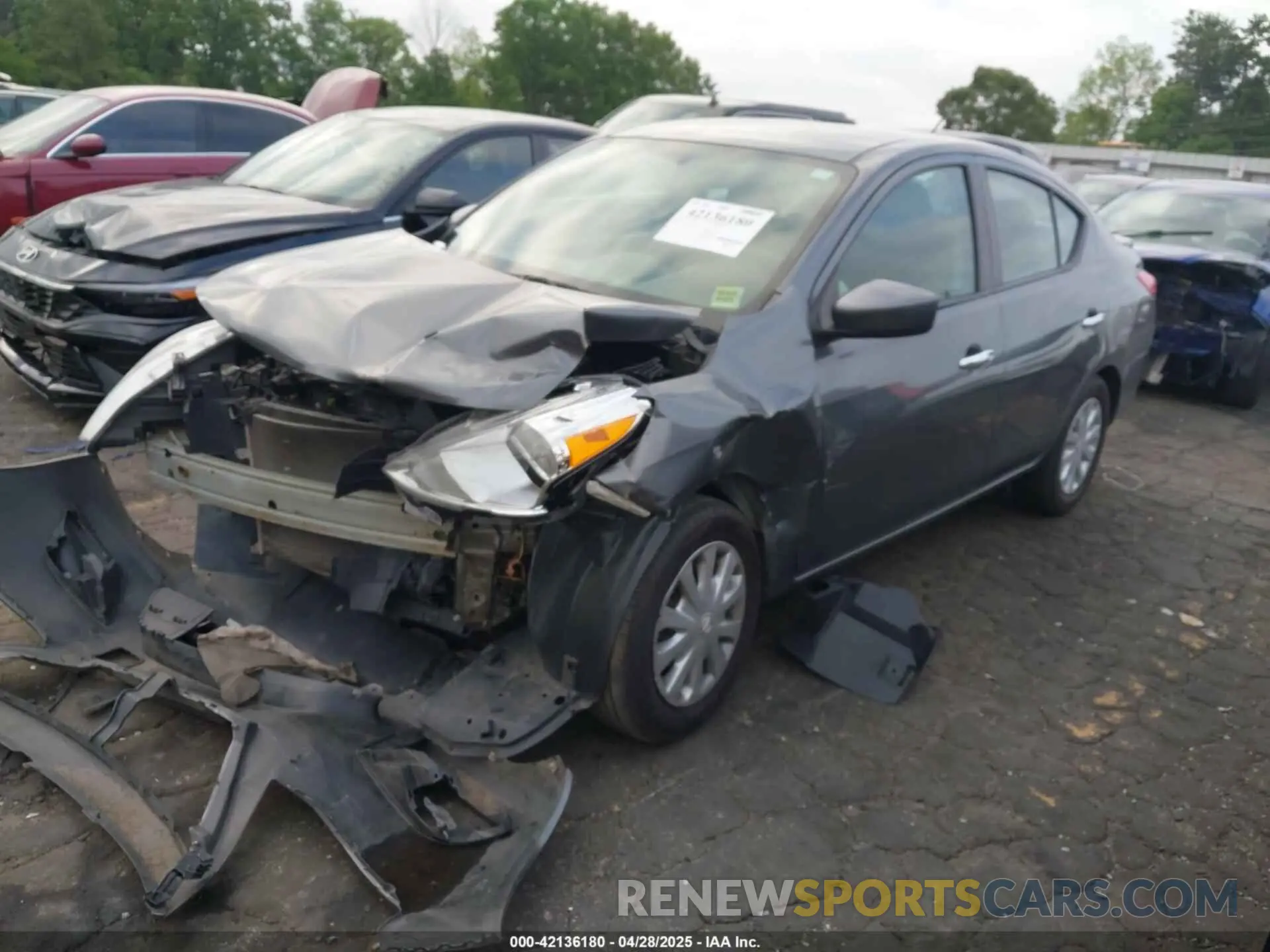 2 fotografías del automóvil dañado 3N1CN7AP1KL869816 NISSAN VERSA 2019