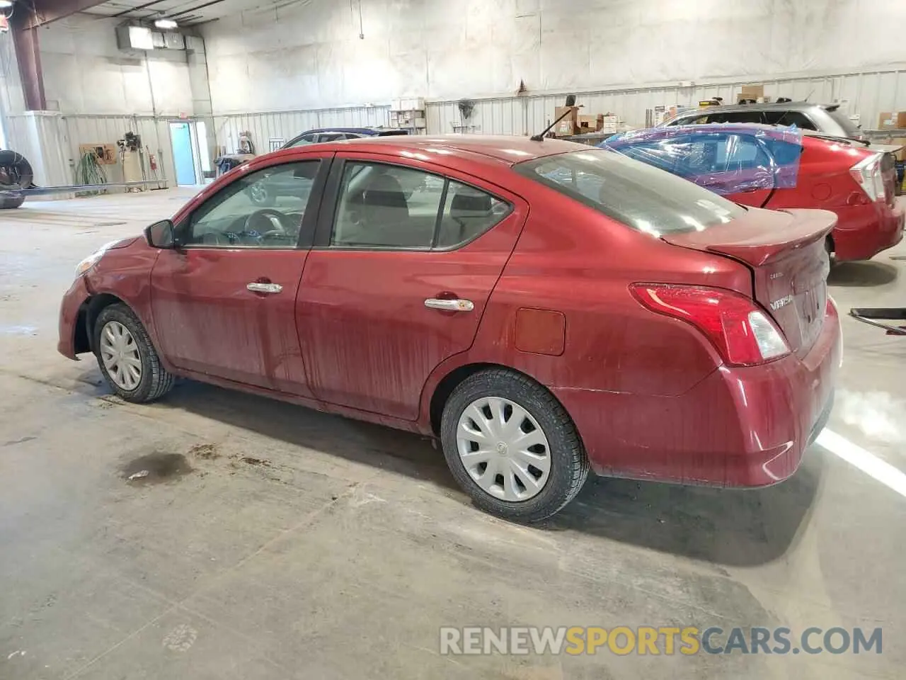 2 fotografías del automóvil dañado 3N1CN7AP6KL801849 NISSAN VERSA 2019