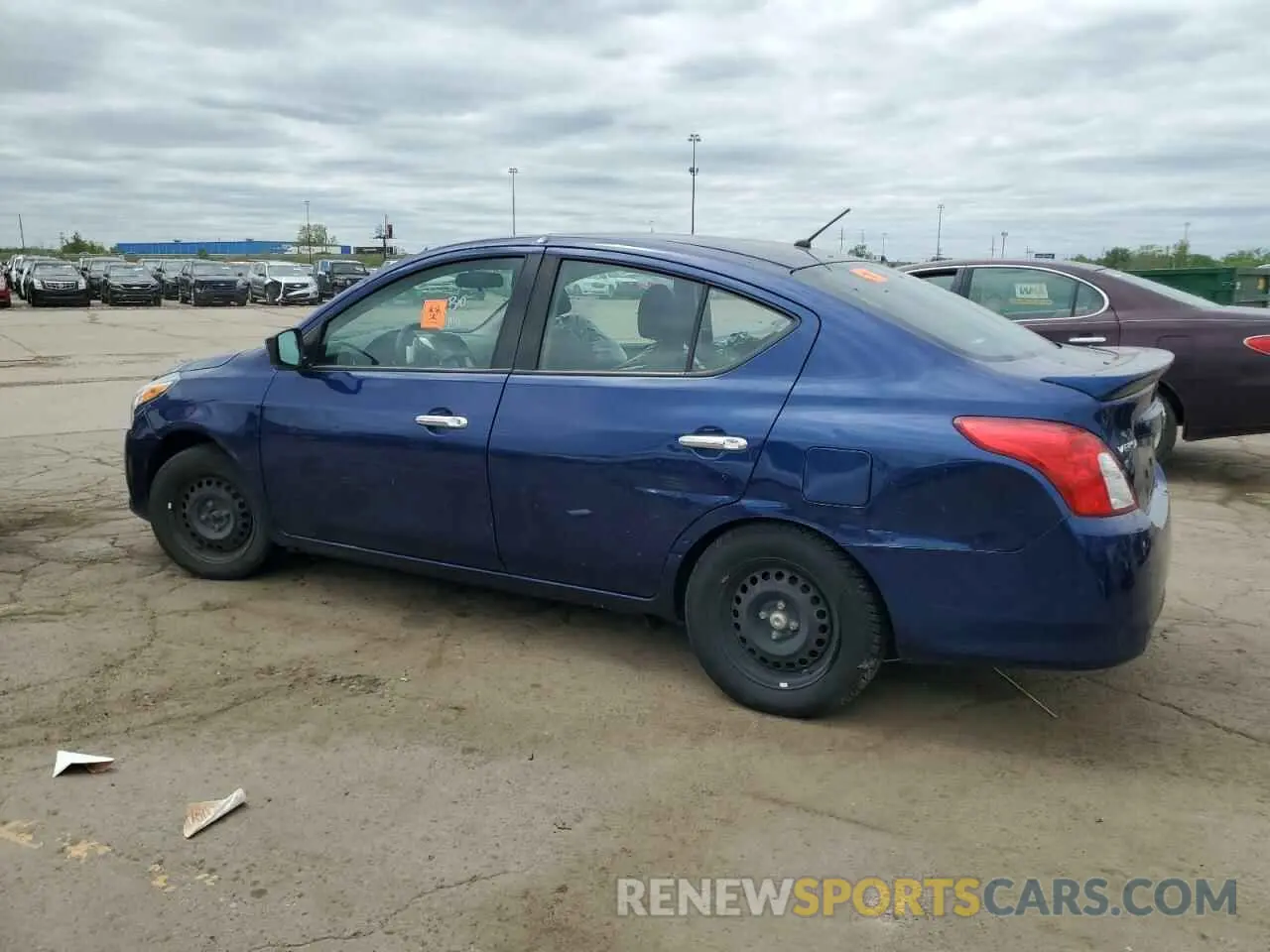 2 fotografías del automóvil dañado 3N1CN7AP7KL878228 NISSAN VERSA 2019