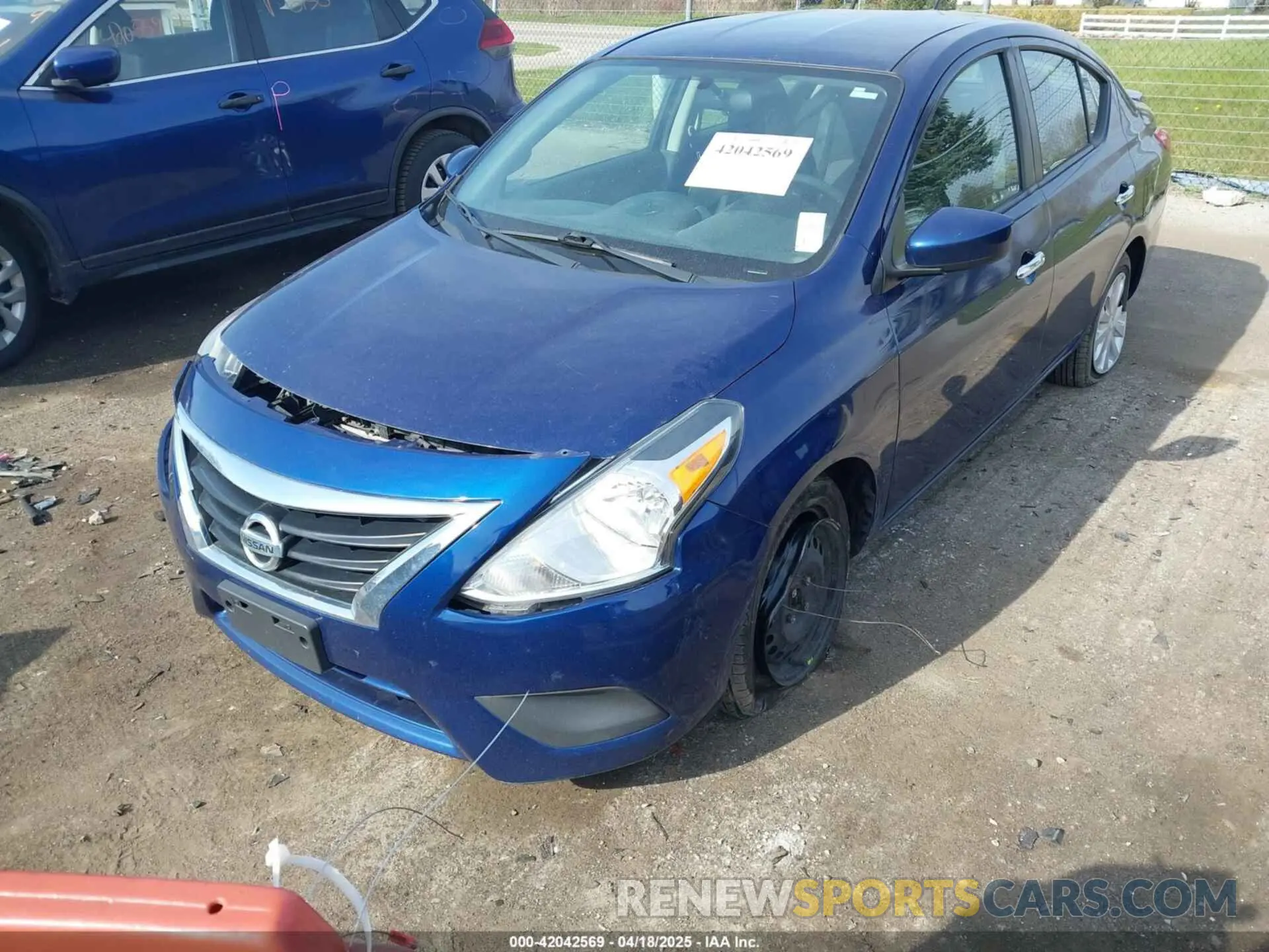 2 fotografías del automóvil dañado 3N1CN7AP9KL870728 NISSAN VERSA 2019