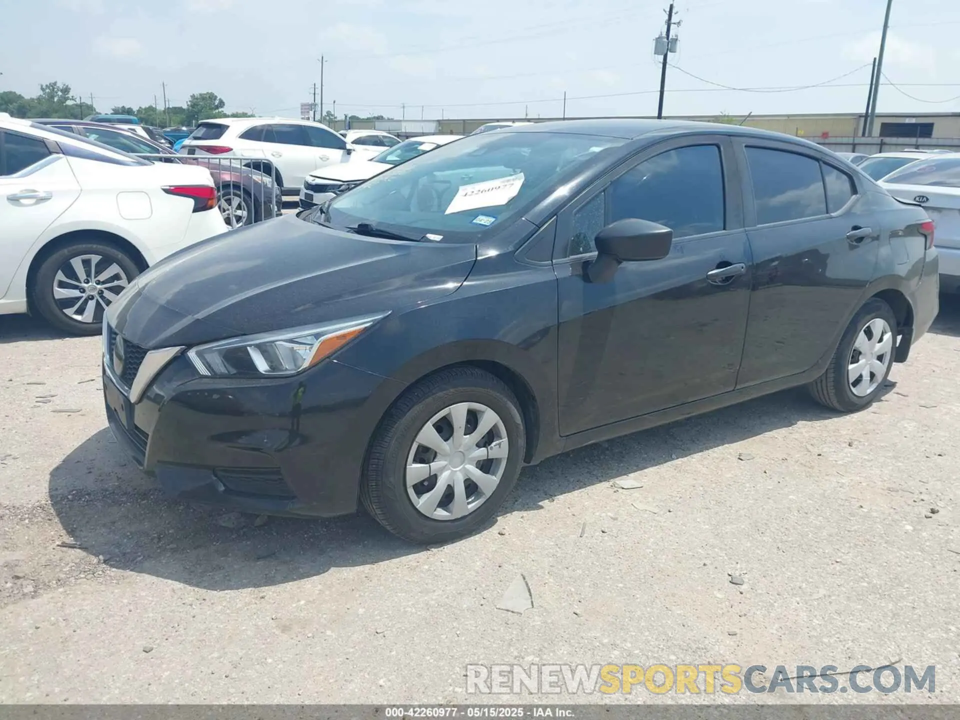 2 fotografías del automóvil dañado 3N1CN8DV2LL873214 NISSAN VERSA 2020