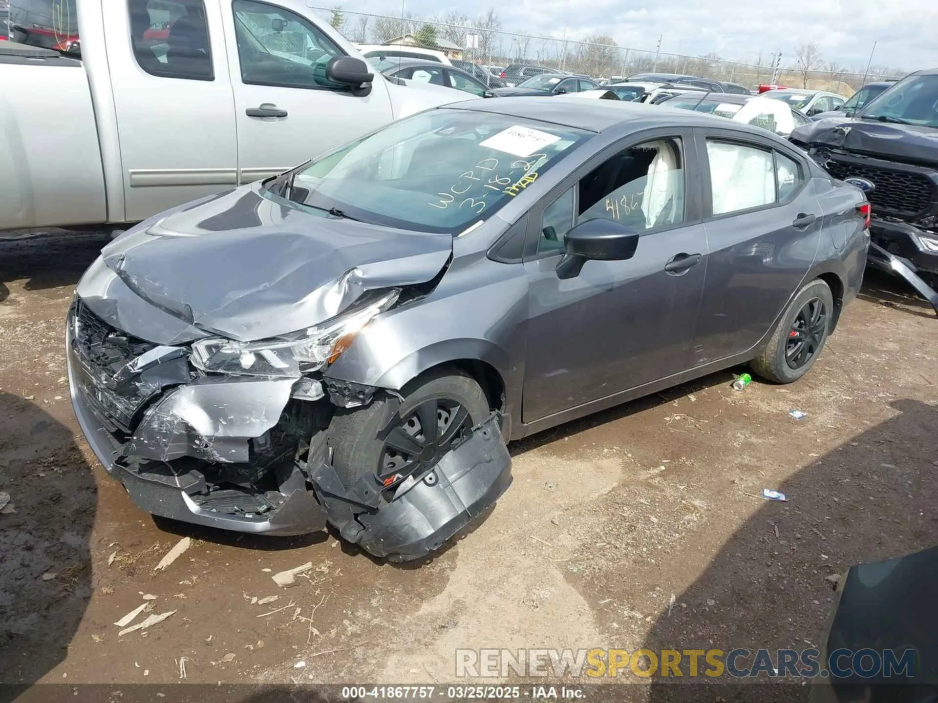 2 fotografías del automóvil dañado 3N1CN8DV9LL810238 NISSAN VERSA 2020