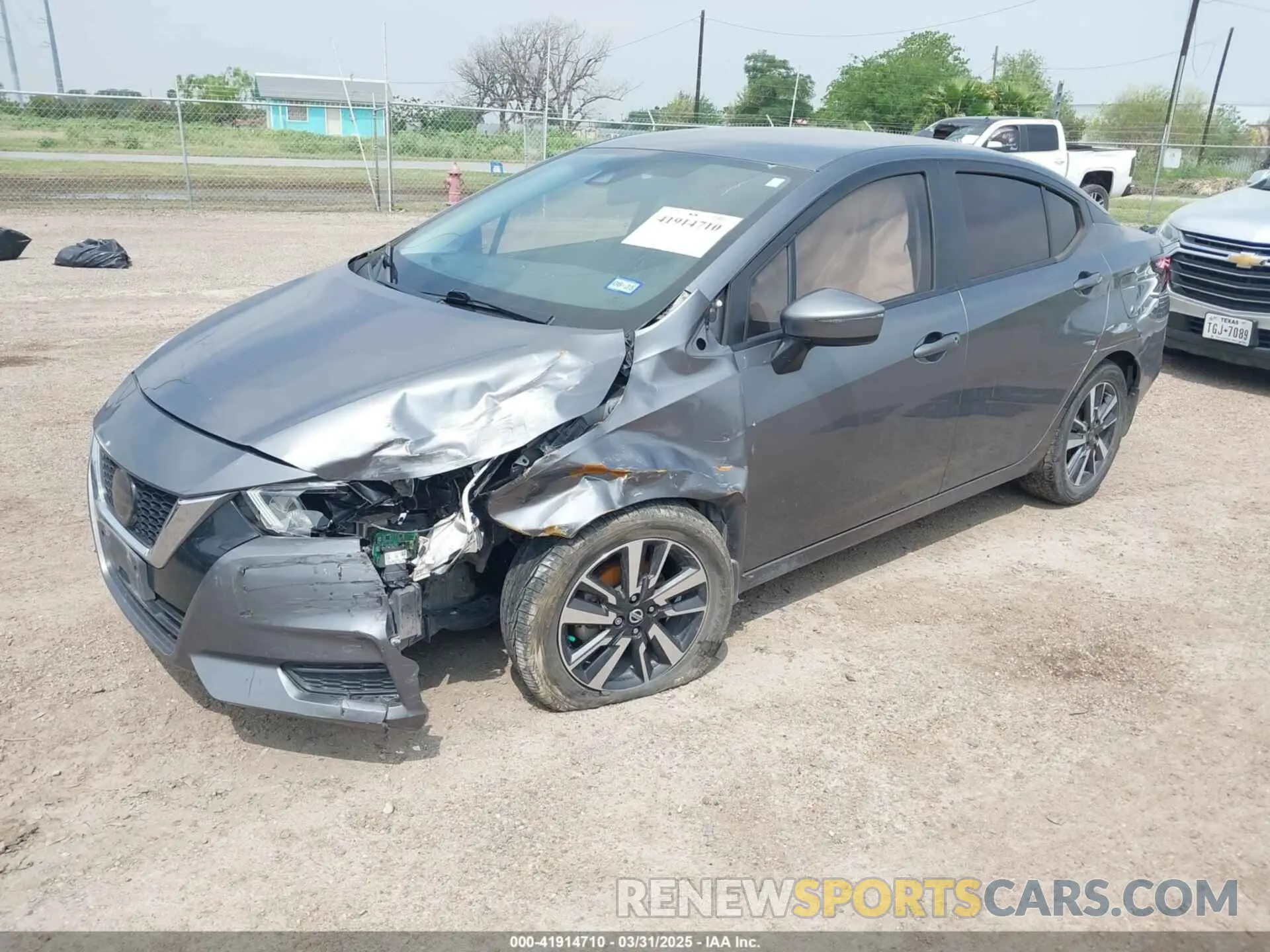 2 fotografías del automóvil dañado 3N1CN8EV0LL868916 NISSAN VERSA 2020