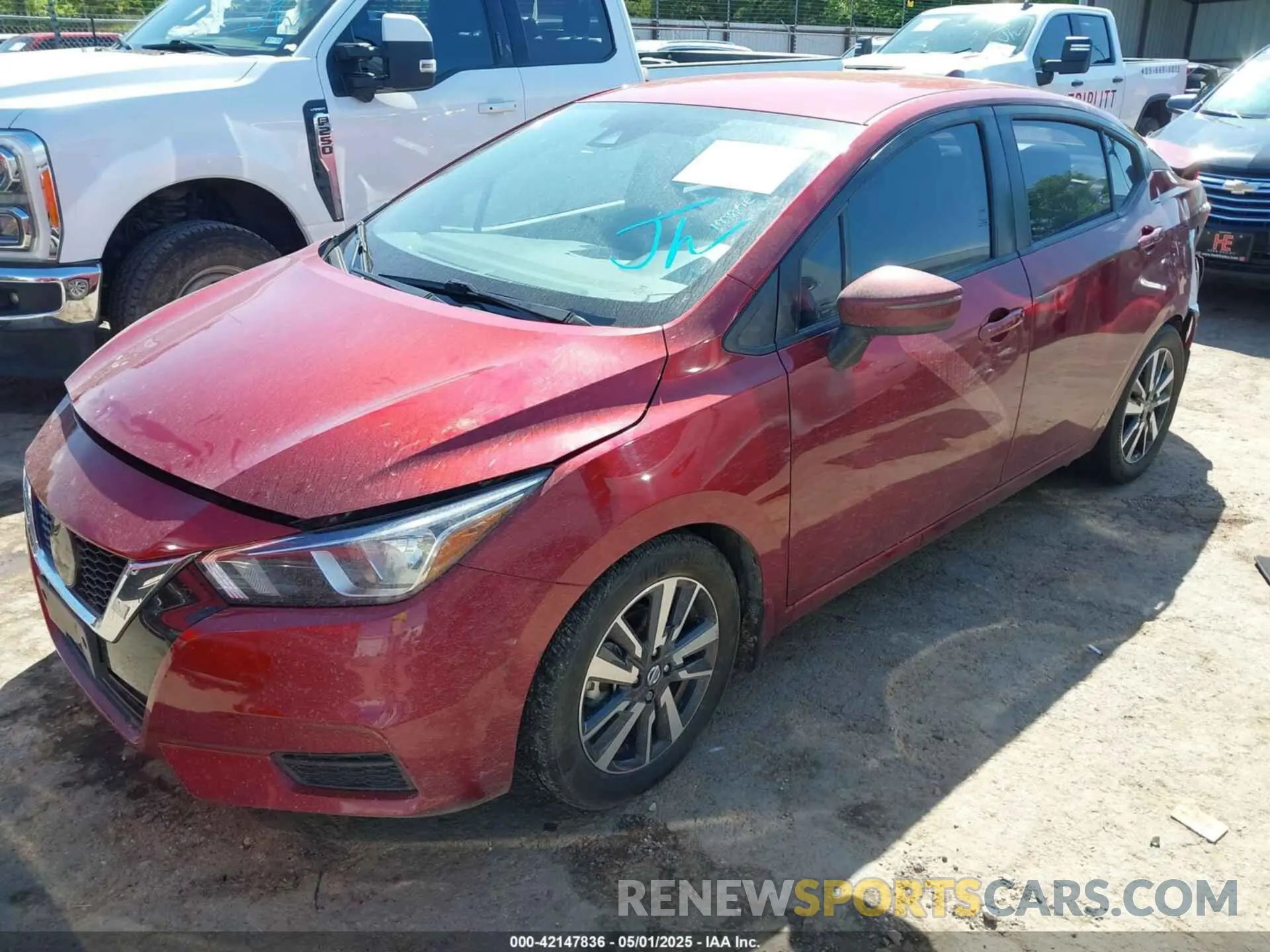 2 fotografías del automóvil dañado 3N1CN8EV2LL864348 NISSAN VERSA 2020