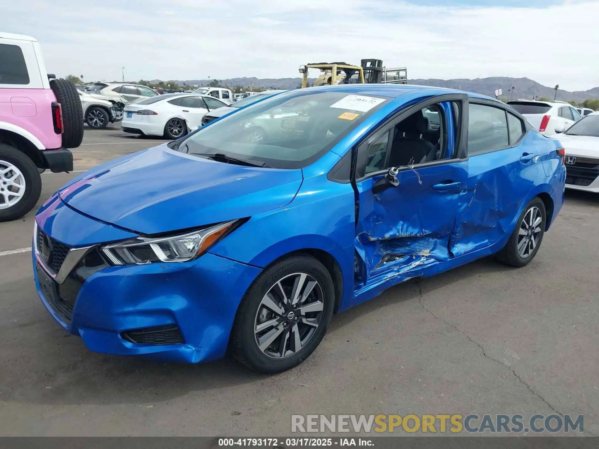2 fotografías del automóvil dañado 3N1CN8EV3LL864424 NISSAN VERSA 2020