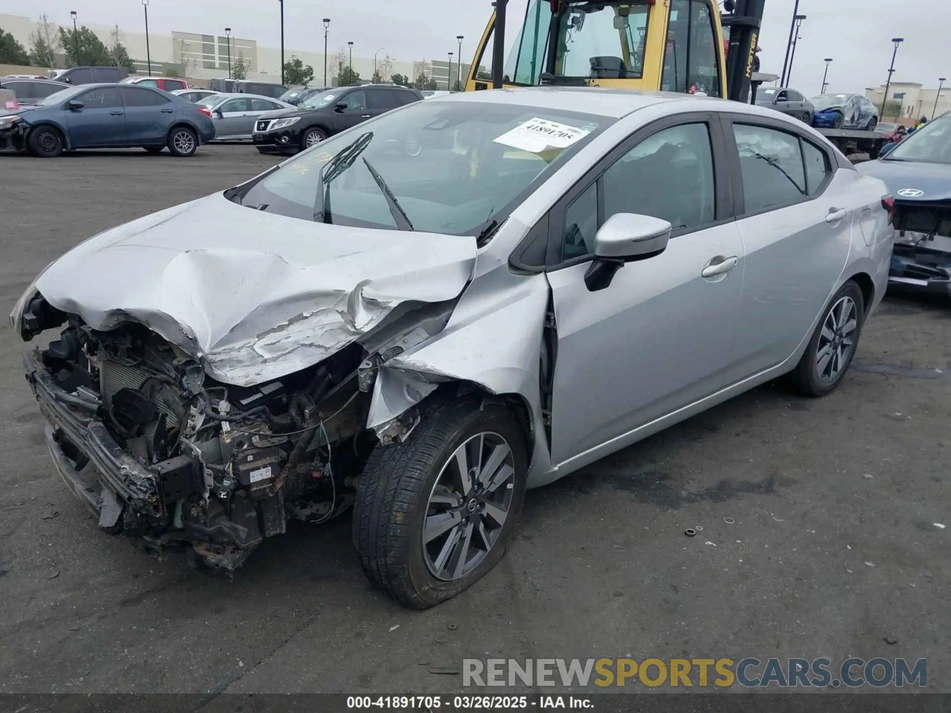 2 fotografías del automóvil dañado 3N1CN8EV7LL818580 NISSAN VERSA 2020