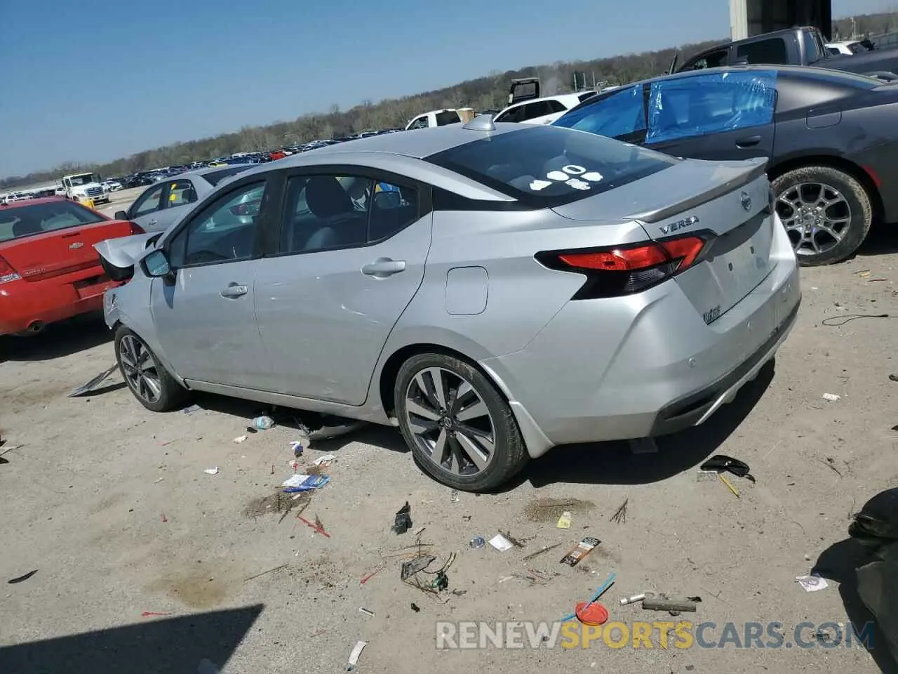 2 fotografías del automóvil dañado 3N1CN8FV2LL804388 NISSAN VERSA 2020