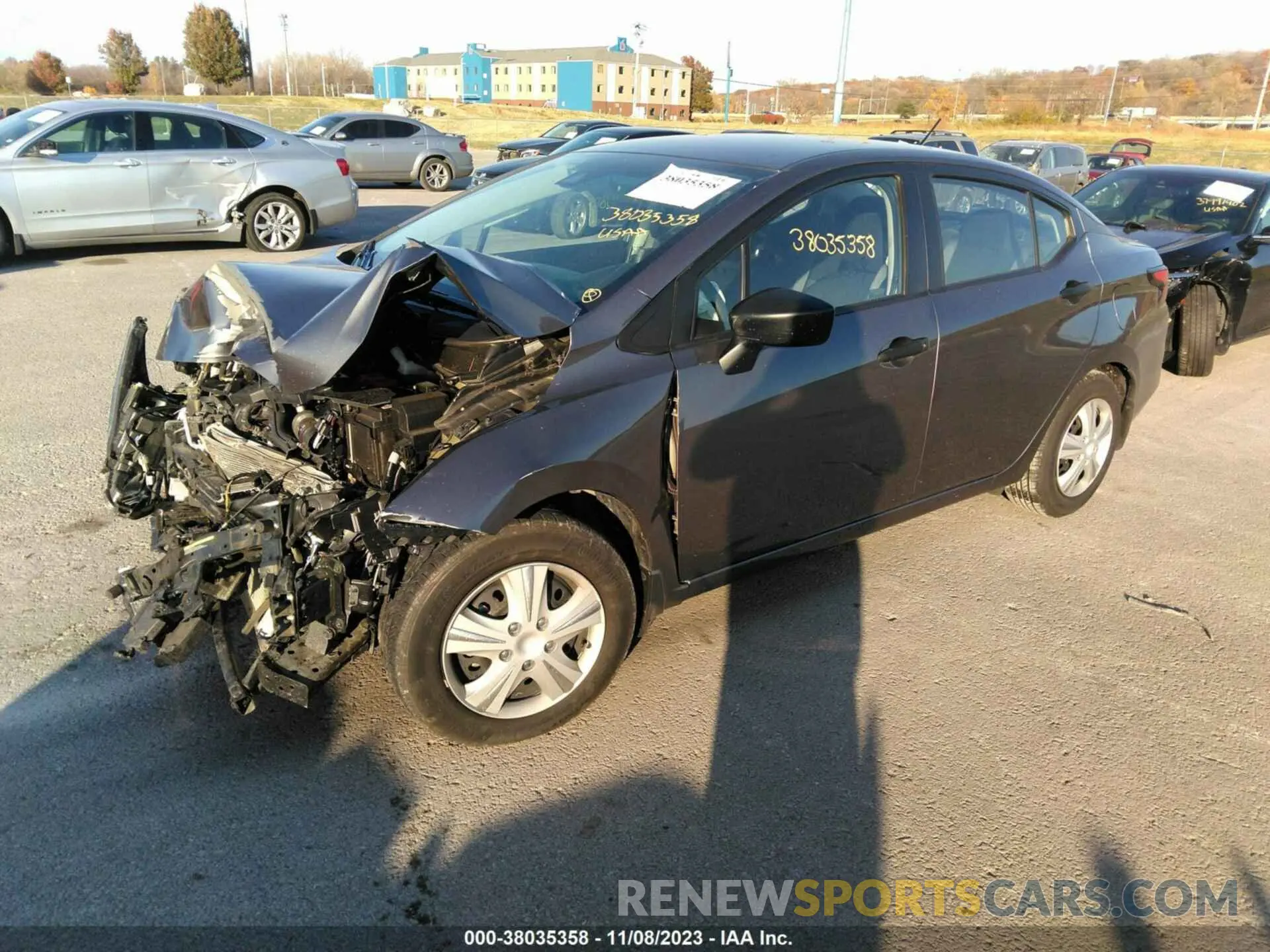 2 fotografías del automóvil dañado 3N1CN8DV0ML813370 NISSAN VERSA 2021