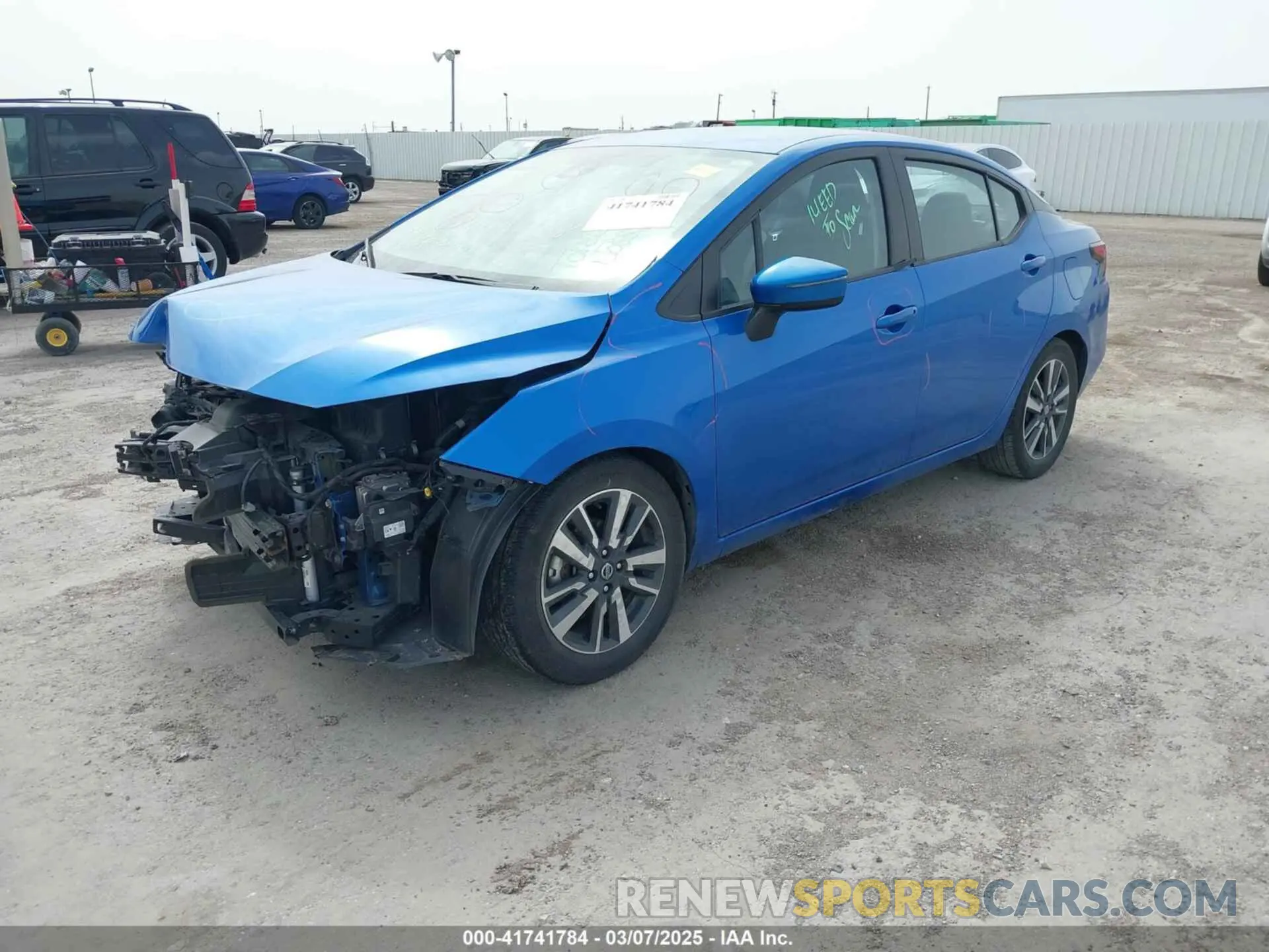 2 fotografías del automóvil dañado 3N1CN8EV0ML872935 NISSAN VERSA 2021