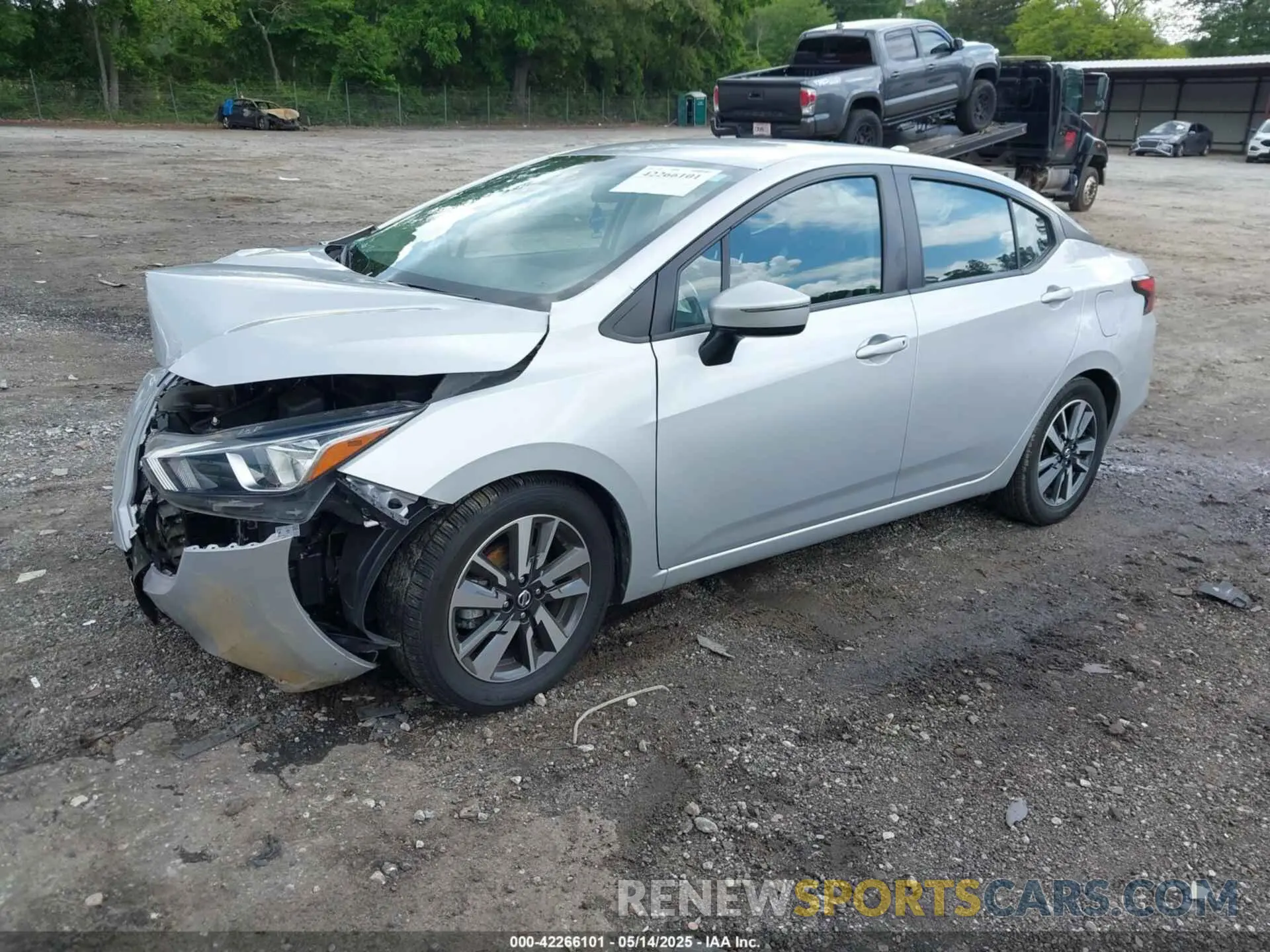 2 fotografías del automóvil dañado 3N1CN8EV0ML896670 NISSAN VERSA 2021