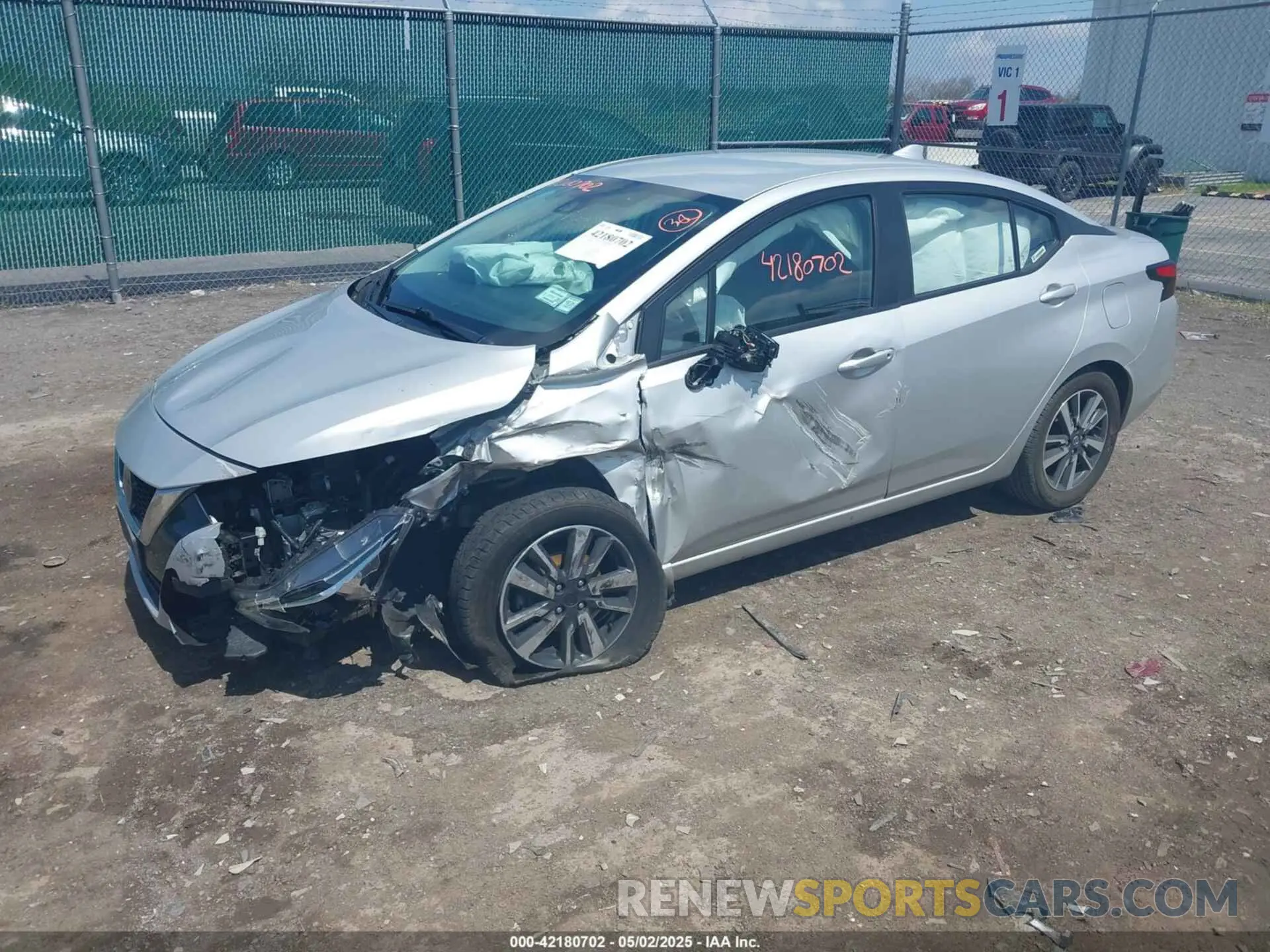 2 fotografías del automóvil dañado 3N1CN8EV1ML832105 NISSAN VERSA 2021