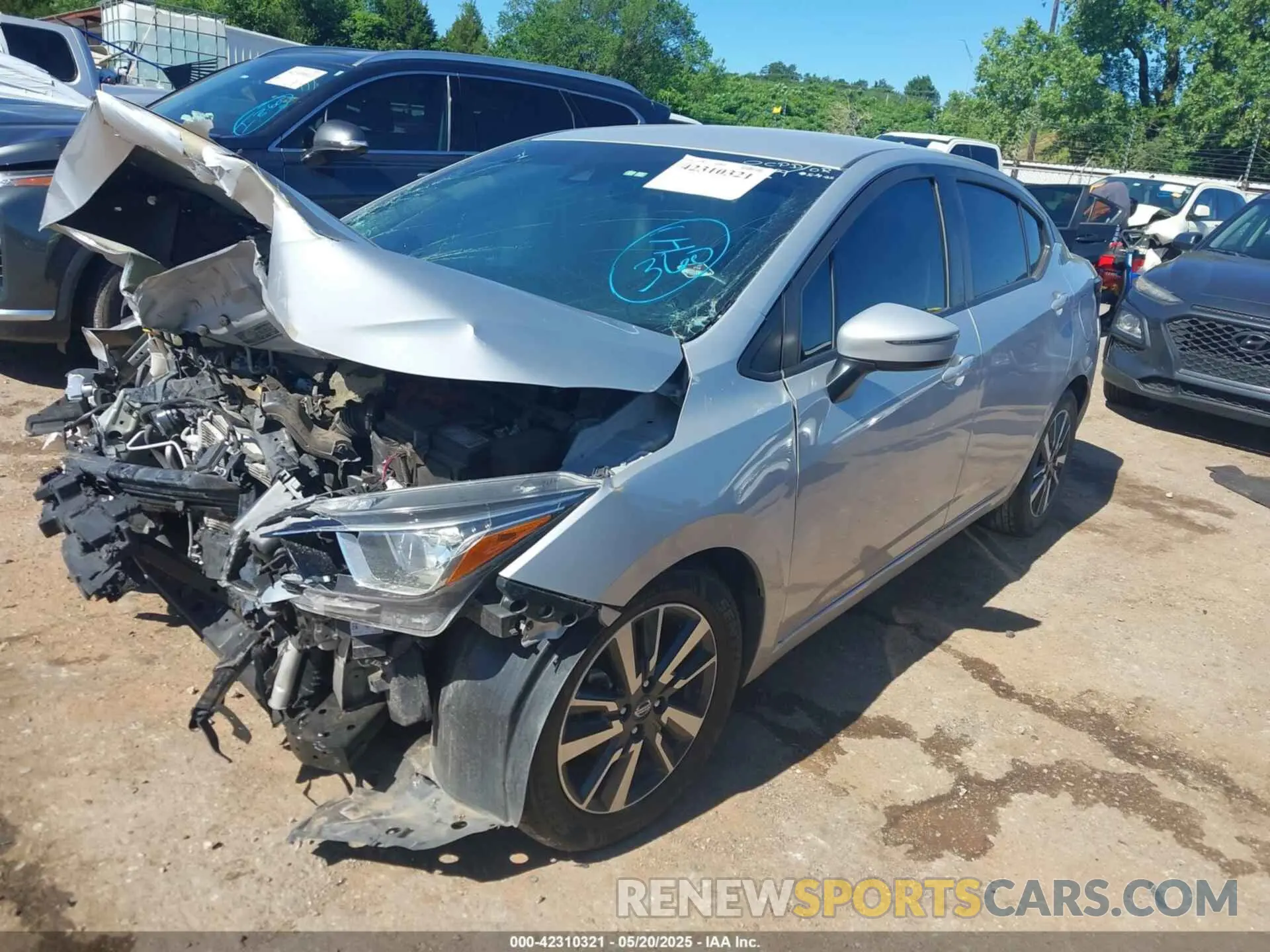 2 fotografías del automóvil dañado 3N1CN8EV6ML839891 NISSAN VERSA 2021